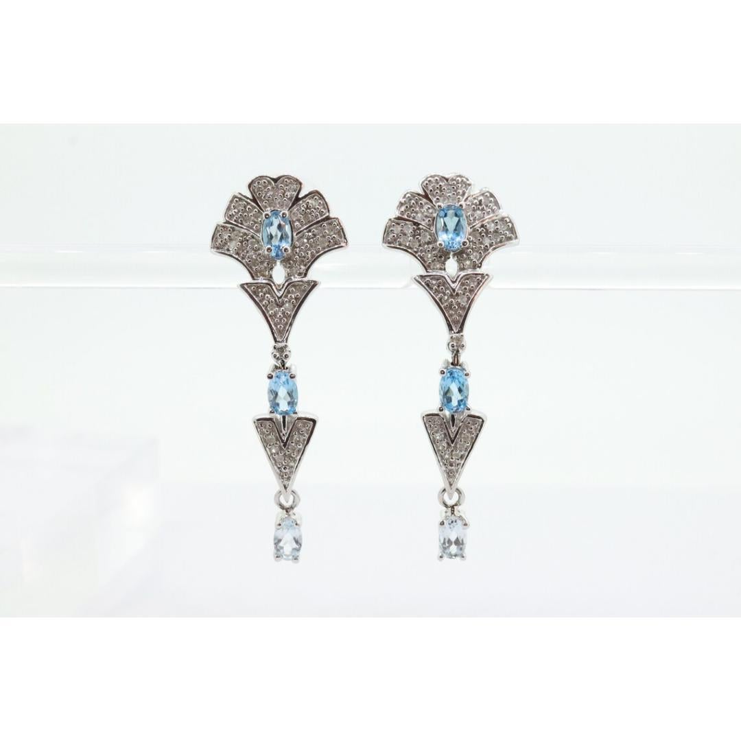 Women's 14k Blue TOPAZ and Diamond Dangle earrings. Blue Topaz Princess Earrings. For Sale
