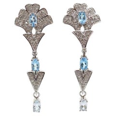 14k Blue TOPAZ and Diamond Dangle earrings. Blue Topaz Princess Earrings.