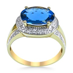 14 Karat Blue Topaz and Diamond Ladies Ring