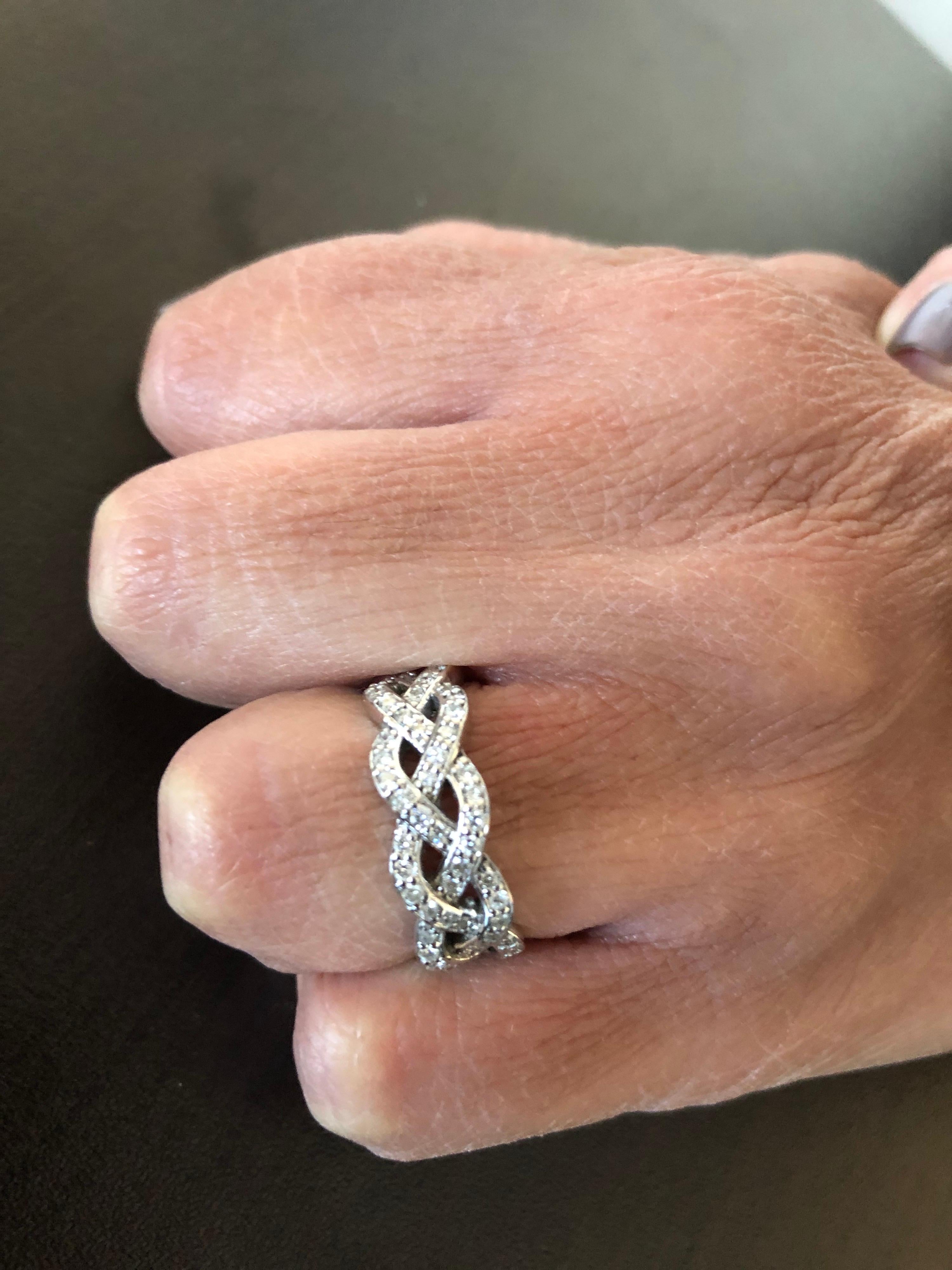 Braided diamond eternity ring set in 14K white gold. The total carat weight is 1.16. The color of the stones are G, the clarity is SI. The band is a size 6.5.
