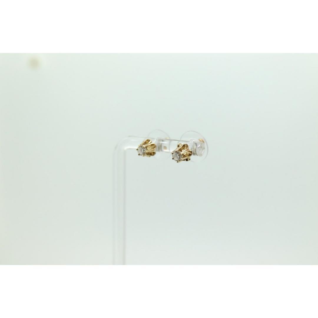 Vintage
Materials: Gold
Gemstone: Diamond
Location: Earlobe
Closure: Screw back

Style: Minimalist


14k Yellow gold Diamond stud earrings. Antique made. Buttercup Setting.

4mm round cut diamonds. 0.24ct. each total 0.50ctw
Est at SI to I Clarity