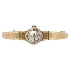 14k CARTIER x MOVADO mechanical watch. 14k YG Genuine Cartier Ladies Watch.