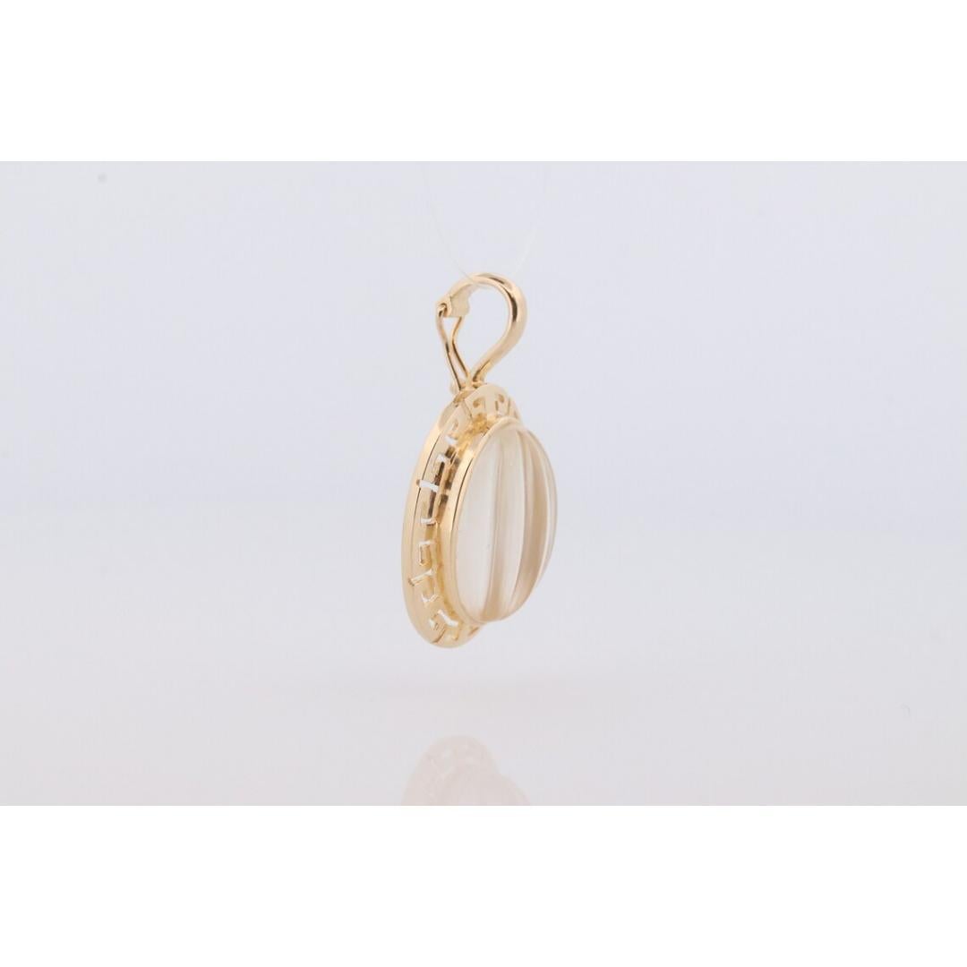 Vintage degli anni '80
Materiali: Oro
Pietra preziosa: Quarzo
Chiusura: Anello a D. A.
Stile della catena: Serpentina

Stile: Metà secolo

Ciondolo in quarzo prezioso intagliato con charme

Dettagli:
Quarzo chiaro di 12 mm per 16 mm
3,7 grammi di