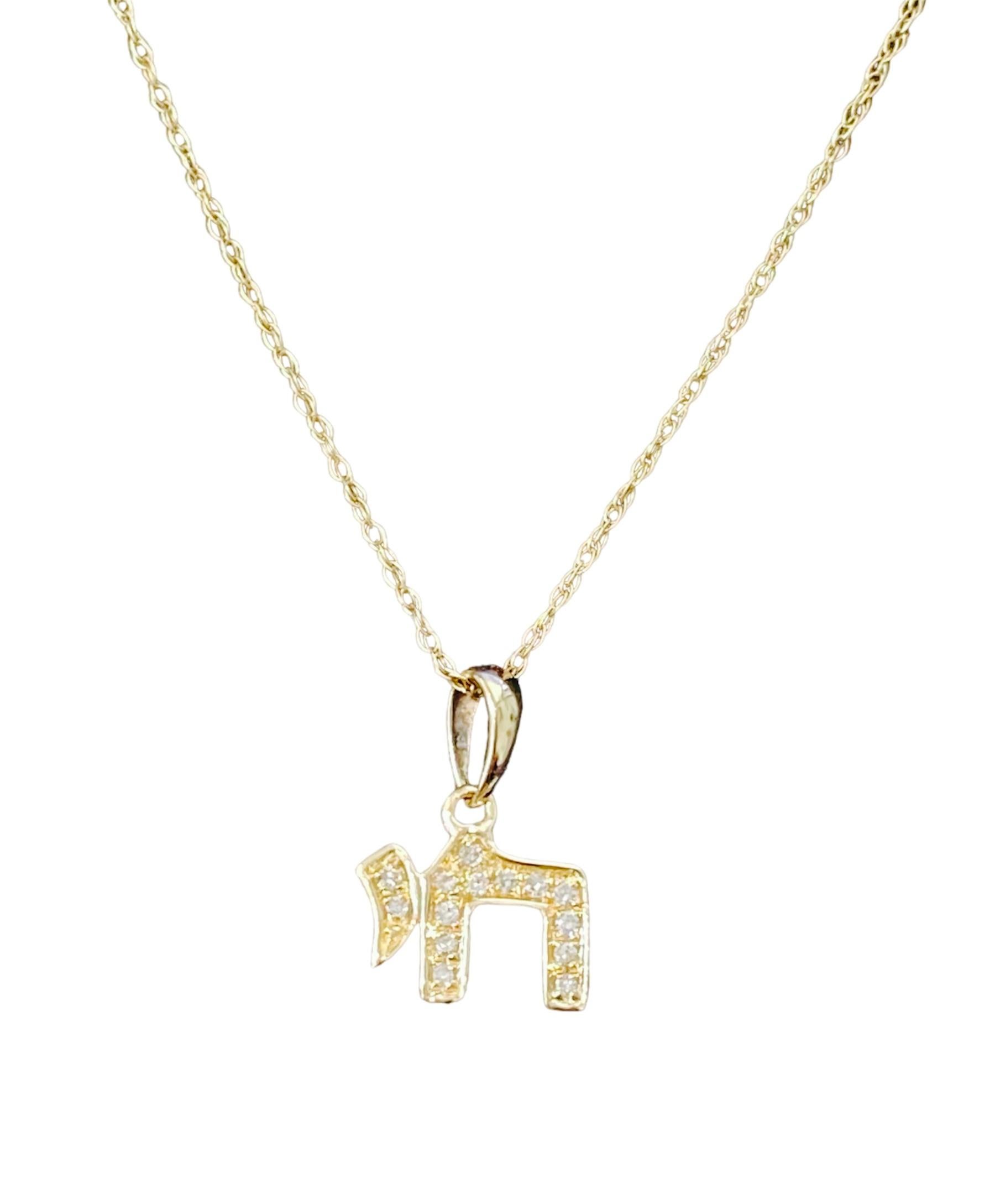 14K Chai Hebrew Natural Diamond Pendant is a stunning and meaningful piece of jewelry that artfully combines cultural significance with timeless elegance.
This pendant is crafted from high-quality 14-karat gold, featuring the Hebrew word
