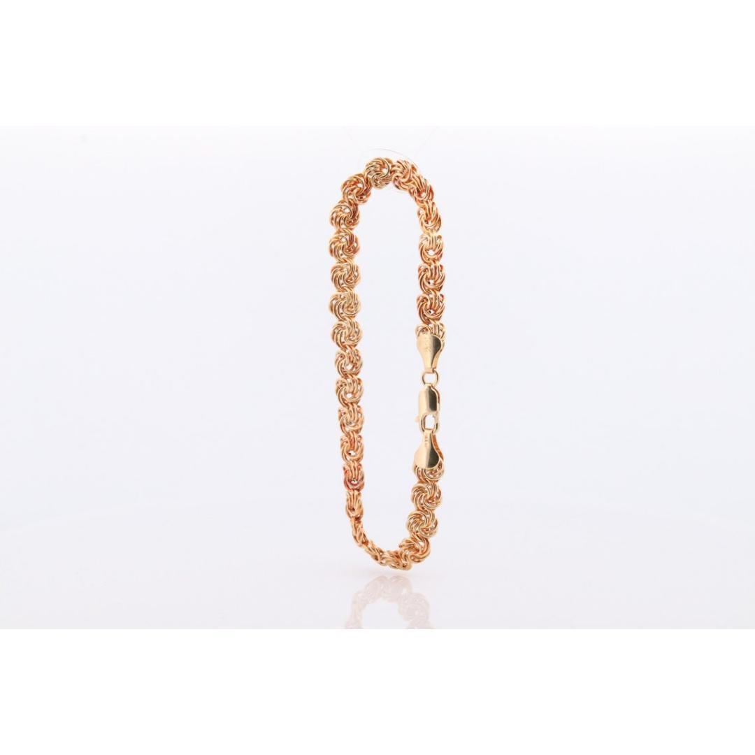Bracelet 14k Coil Weave. Bracelet de chaîne à maillons ronds en or jaune avec nœud d'amour. en vente 2