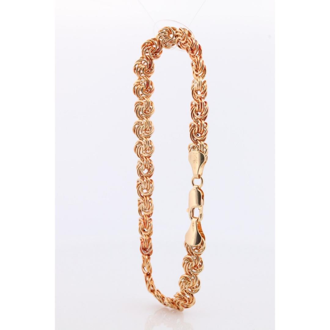 Bracelet 14k Coil Weave. Bracelet de chaîne à maillons ronds en or jaune avec nœud d'amour. en vente 3