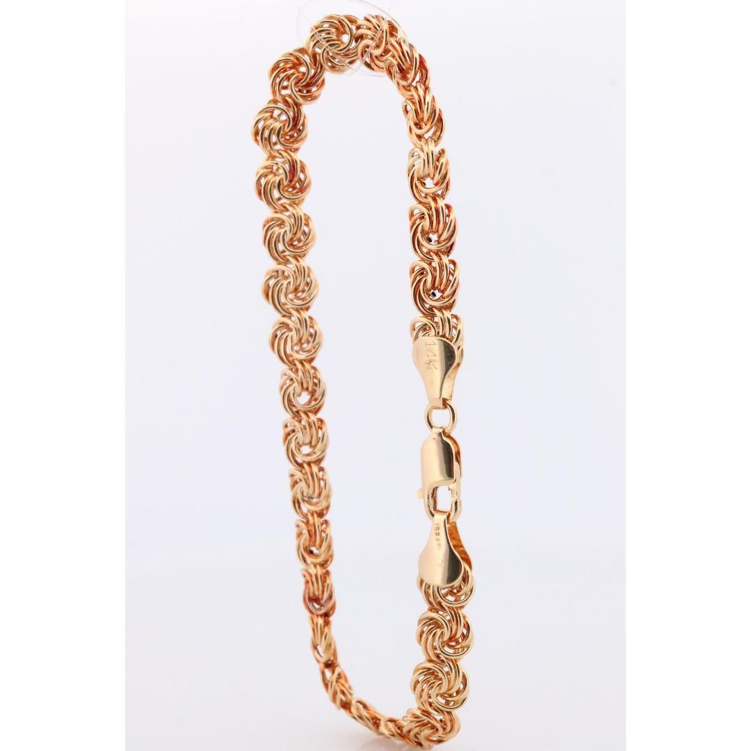 Bracelet 14k Coil Weave. Bracelet de chaîne à maillons ronds en or jaune avec nœud d'amour. en vente 4