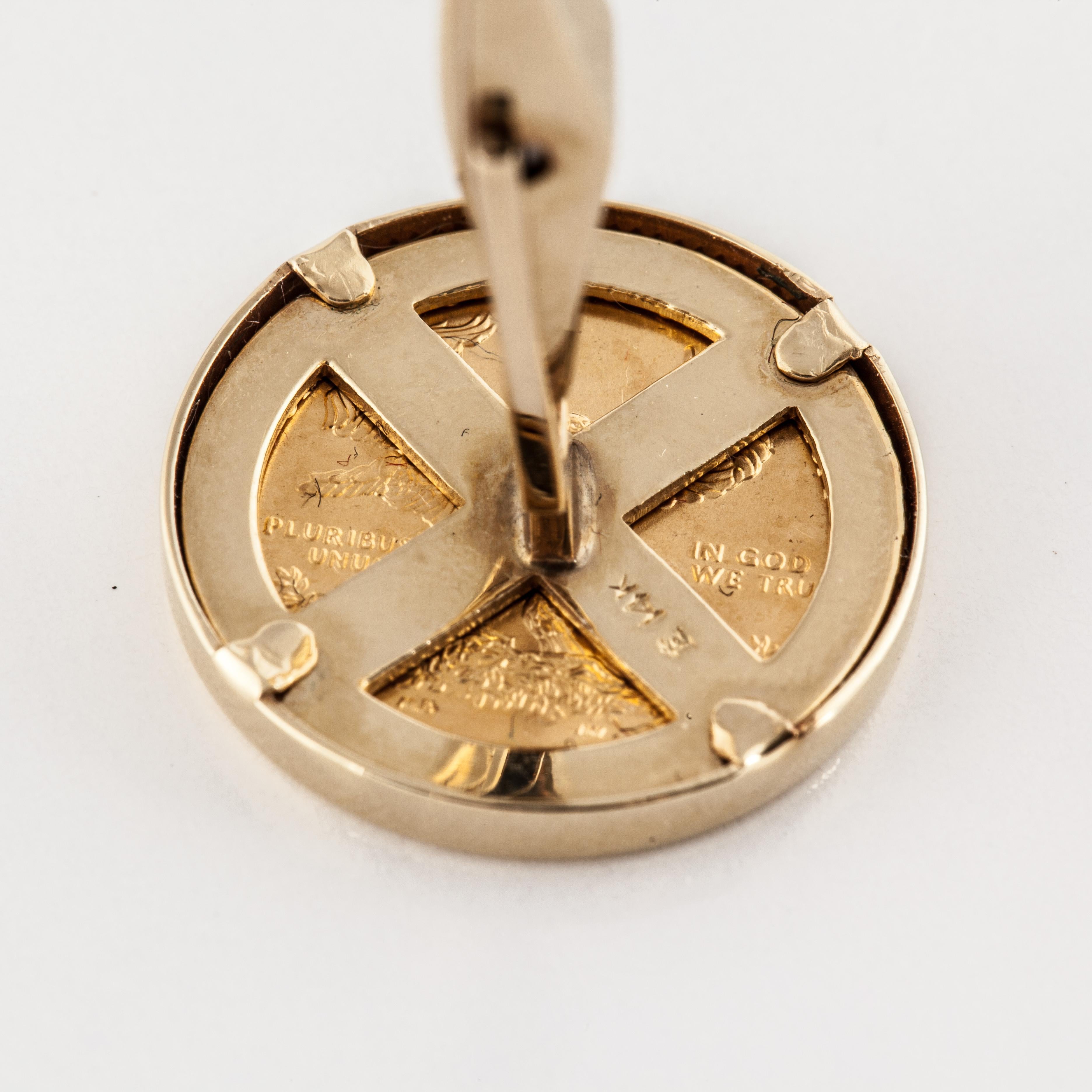 14K yellow gold cufflinks with two different 24K coins.  One coin is a Krugerrand 1/10 oz. circa 1983.  The other coin is an American Liberty circa 2012.  Measure 11/16 inches across.  