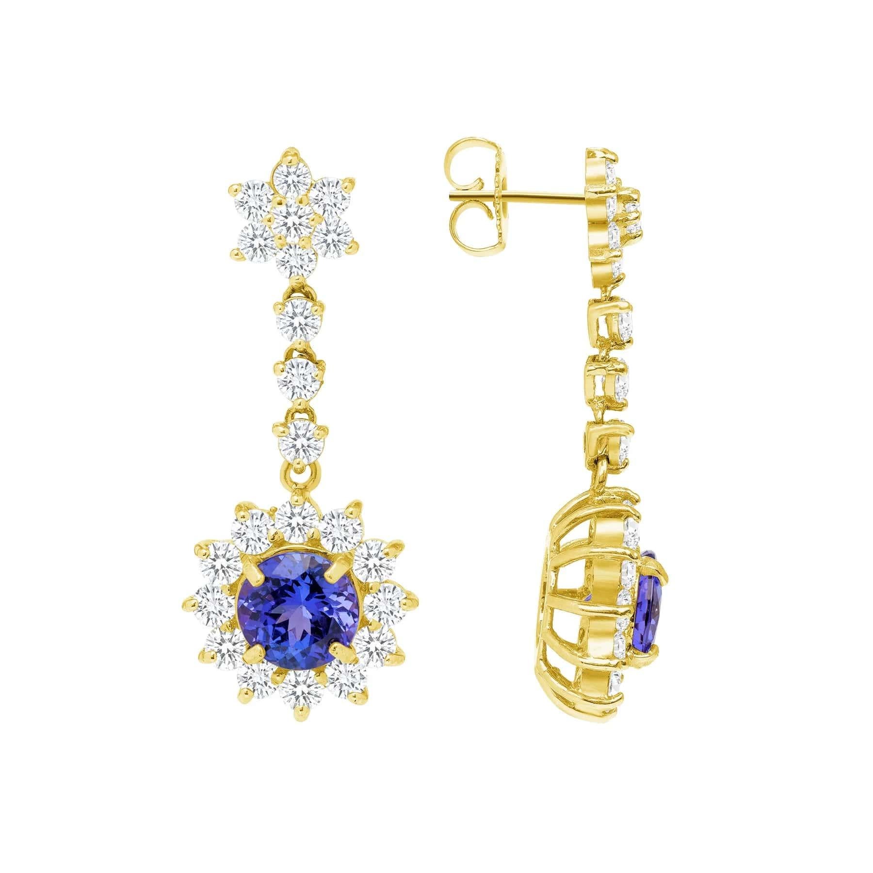 Perfect as a gift for Anniversary, Birthday, Wedding, and/or Holiday.

Earring Information
Setting : Halo
Metal : 14k Gold
Diamond Carat Weight : 1 Carat
Gemstone Type : Blue Sapphire (Center Stones) and Diamonds (Side Stones)
Diamond Clarity : VS