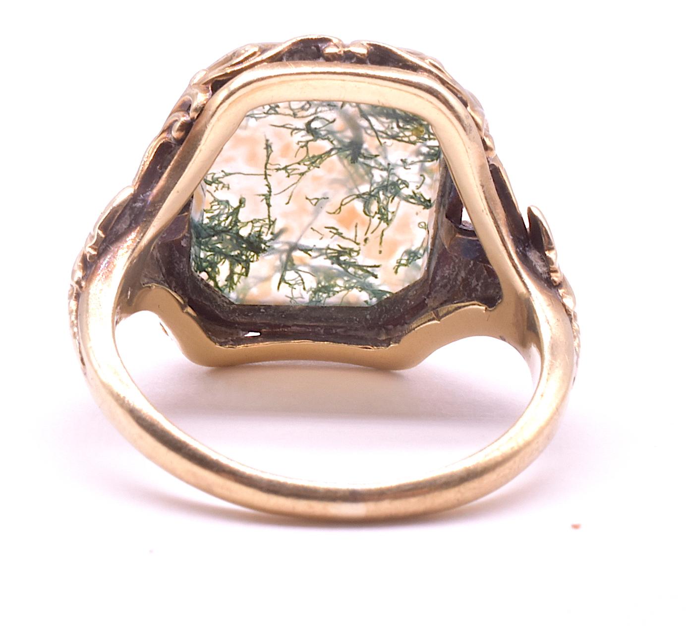 Dendritic Agate is from the chalcedony family of stones and is translucent to opaque in color, depending on whether it is open in the back or closed. The perfectly shaped and highly polished dendritic agate on our 15K gold backed ring is opaque,