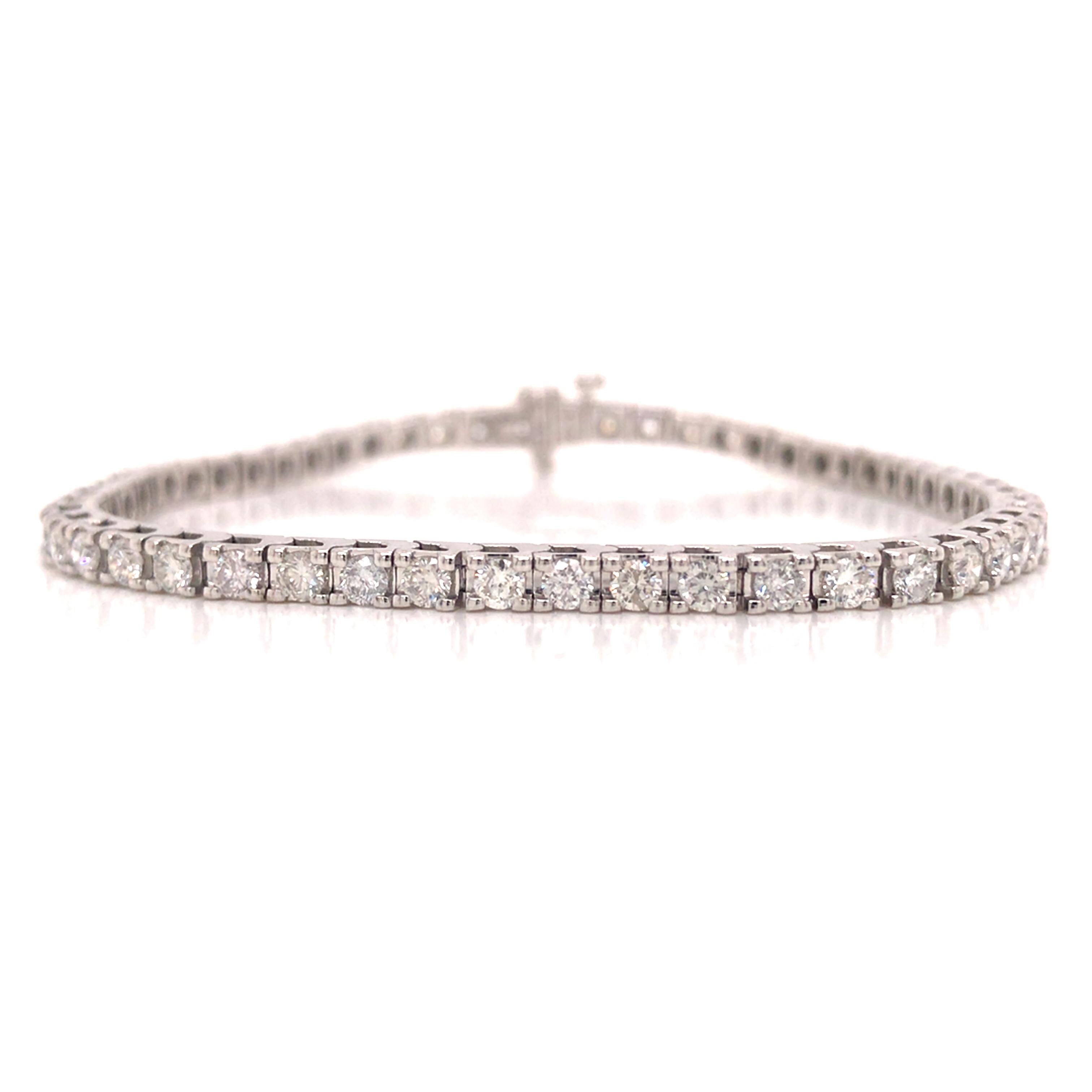 Diamond 3.42 Carat Tennis Bracelet in 14K White Gold.  Round Brilliant Cut Diamonds weighing 3.42 carat total weight, G-H in color and VS-SI in clarity are expertly set.  The Bracelet measures 7 inch in length and approximately 1/8 inch in width. 