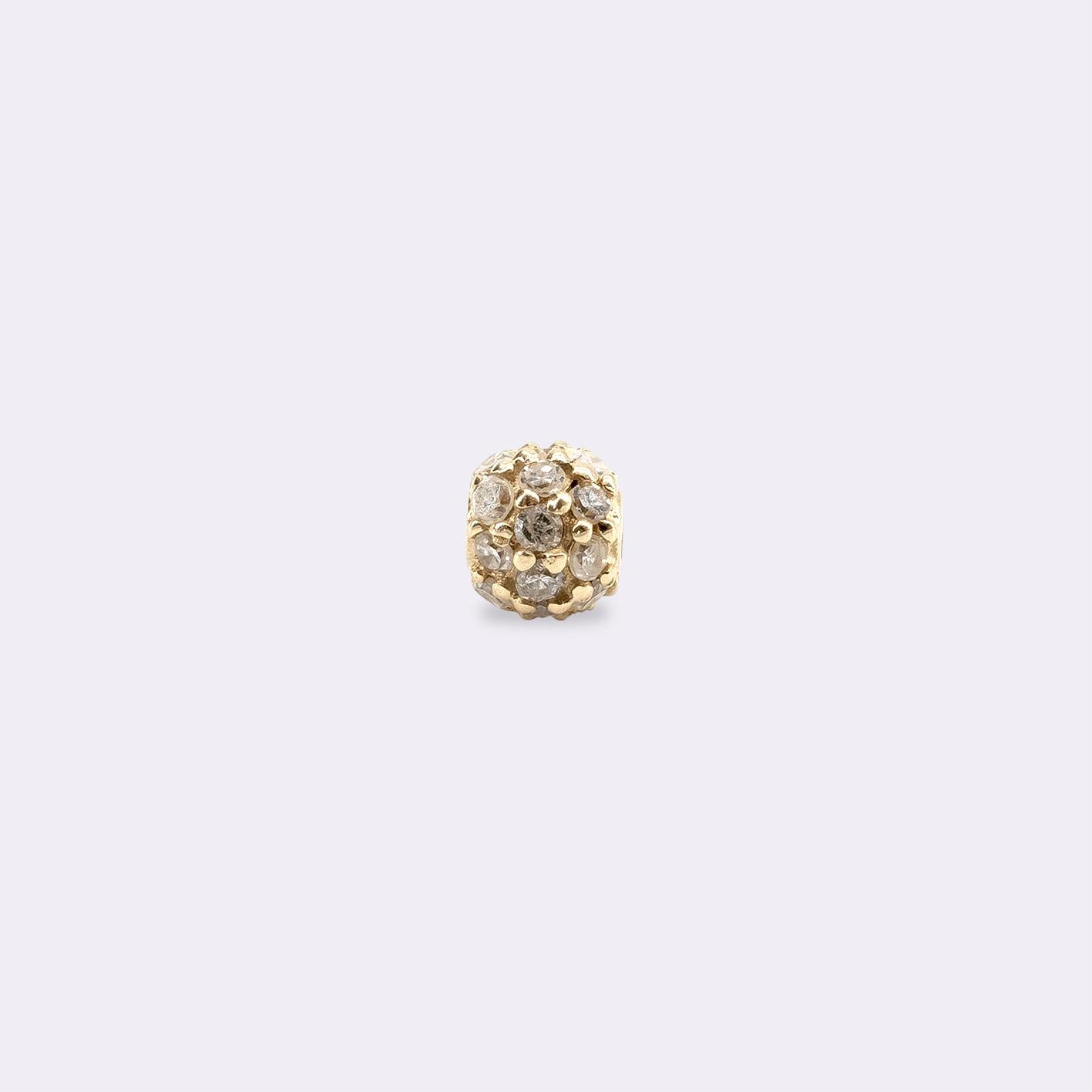 14k yellow gold
21 white diamonds
Diameter 4 mm
Rainbow nylon drawstring closure

This bracelet is a modern classic. Its concise design speaks for itself. The bracelet is barely noticeable, but the diamond ball refracts the light in an impressive