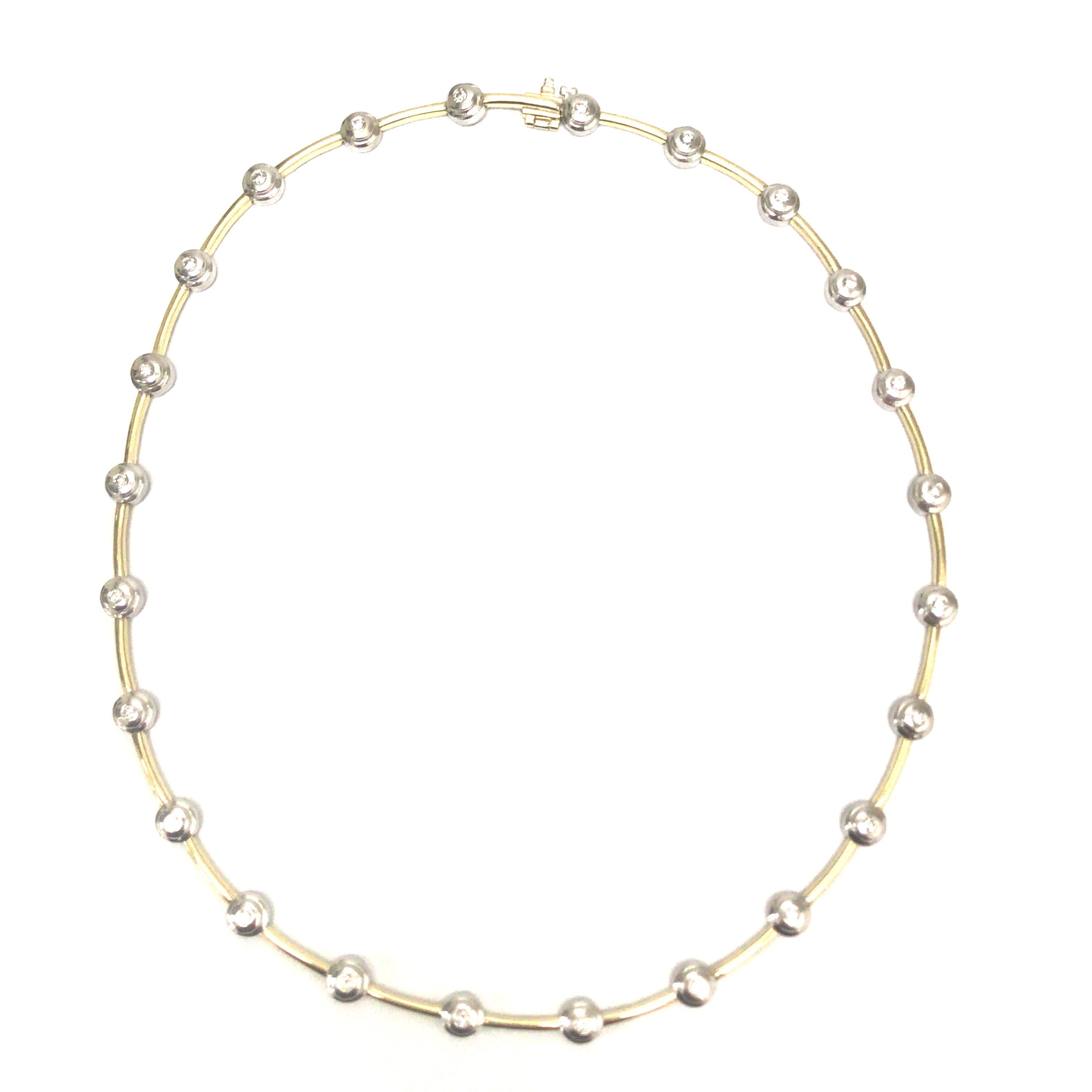 Diamant-Lünetten-Halskette aus zweifarbigem 14-karätigem Gold.  (23) Round Brilliant Cut Diamanten mit einem Gesamtgewicht von 1,28 Karat, G-I in Farbe und VS-SI in Klarheit sind fachmännisch Lünette gesetzt abwechselnd mit Gold Links.  Die