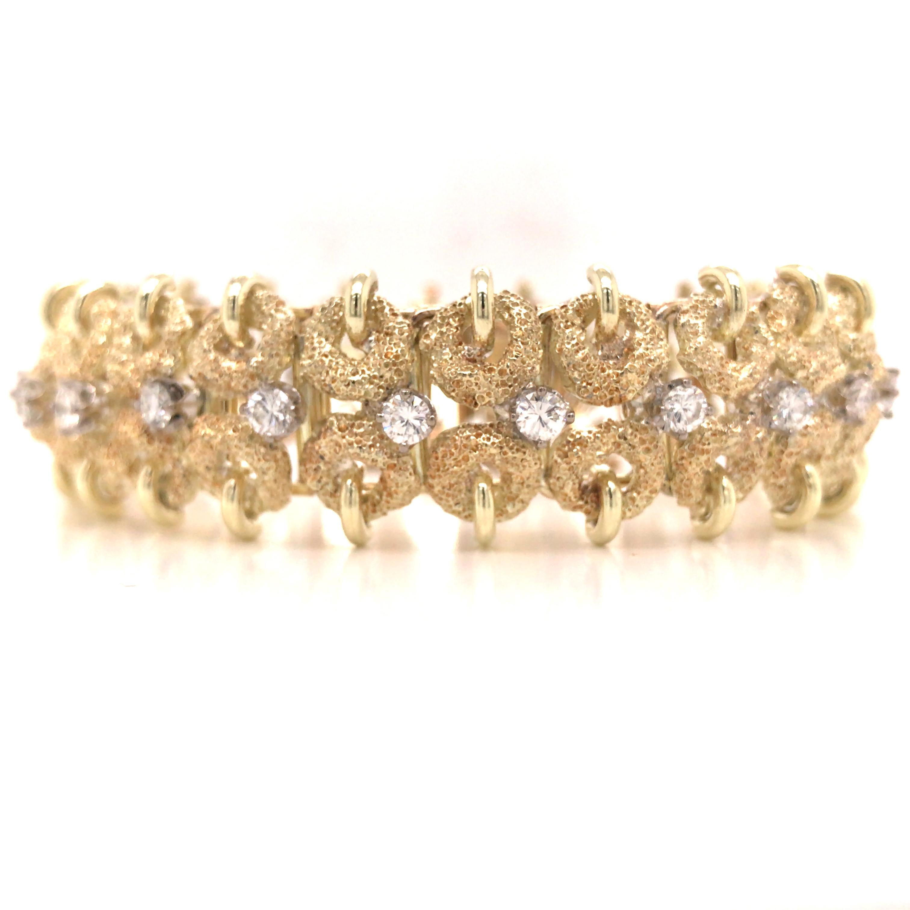 Diamond Circle Link Bracelet in 14K Yellow Gold.  Round Brilliant Cut Diamonds weighing 3.30ctw G-H in color and VS-SI in clarity are expertly set.  The Bracelet measures 6 1/2 inch in length and 3/4 inch in width. Stamped 