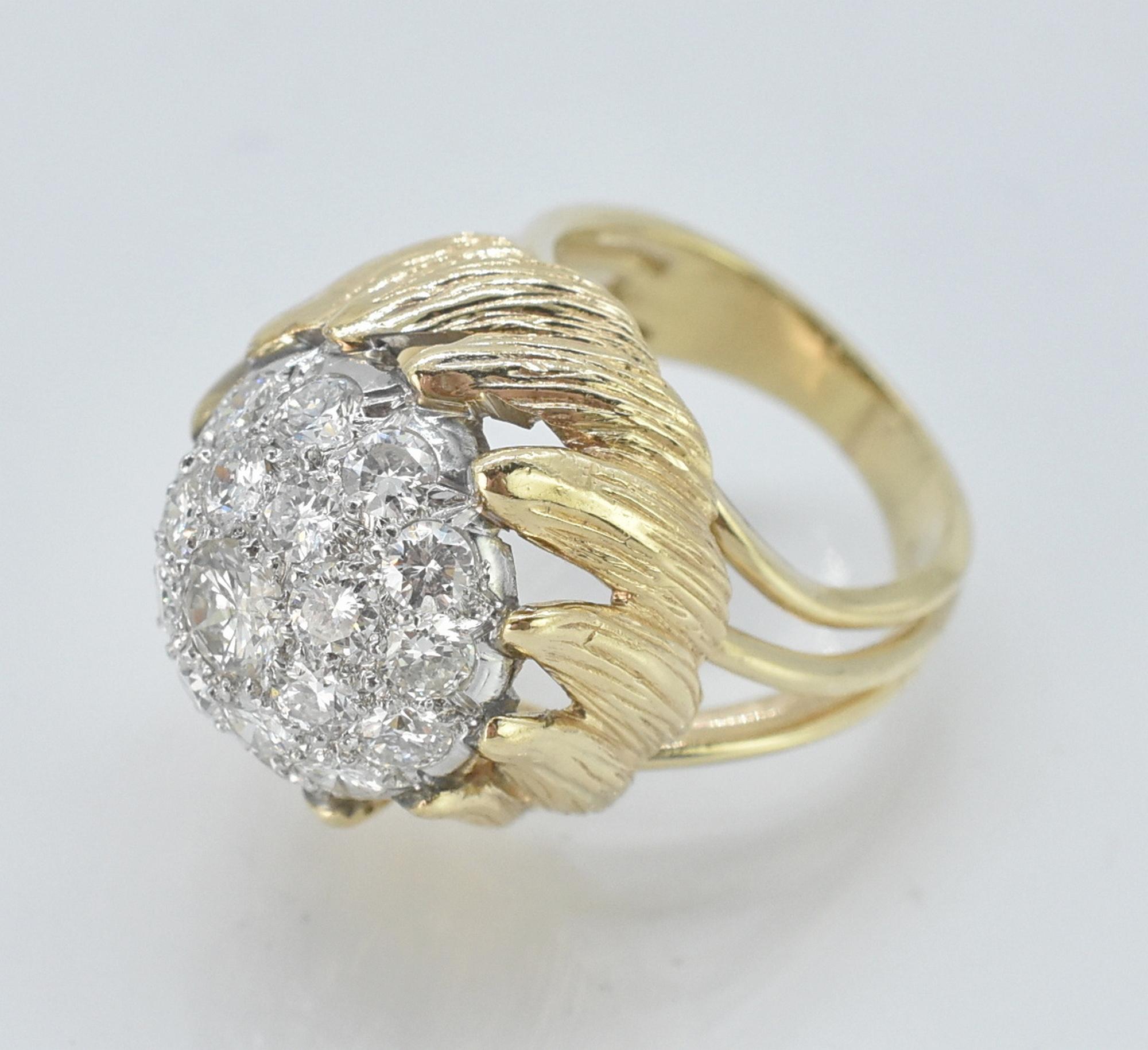 14K diamond cluster ring, 2.0 CTTW. 14K yellow gold and diamond cluster ring. .75 ct center stone, with 2.0 cttw VS-SI. Large setting with wave design on gold setting, diamond cluster dome. Dome is 5/8