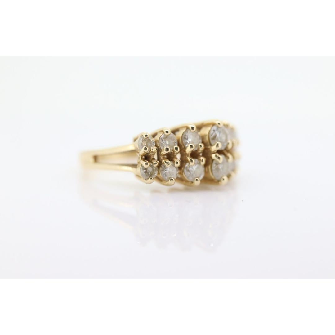 Women's 14k Diamond Cluster ring. Graduated 1ctw diamonds in 2 rows prong set band. For Sale