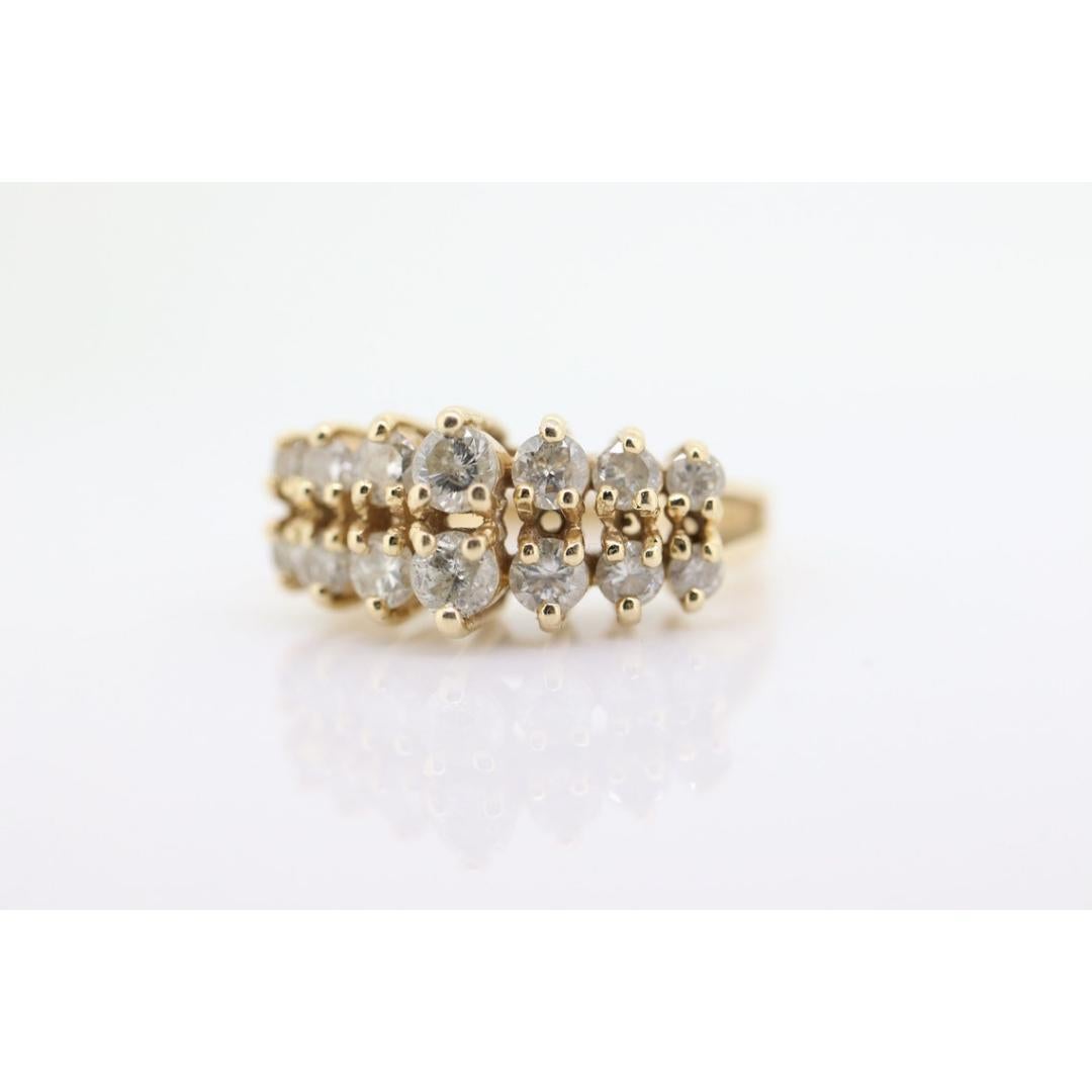 14k Diamond Cluster ring. Graduated 1ctw diamonds in 2 rows prong set band. For Sale 3