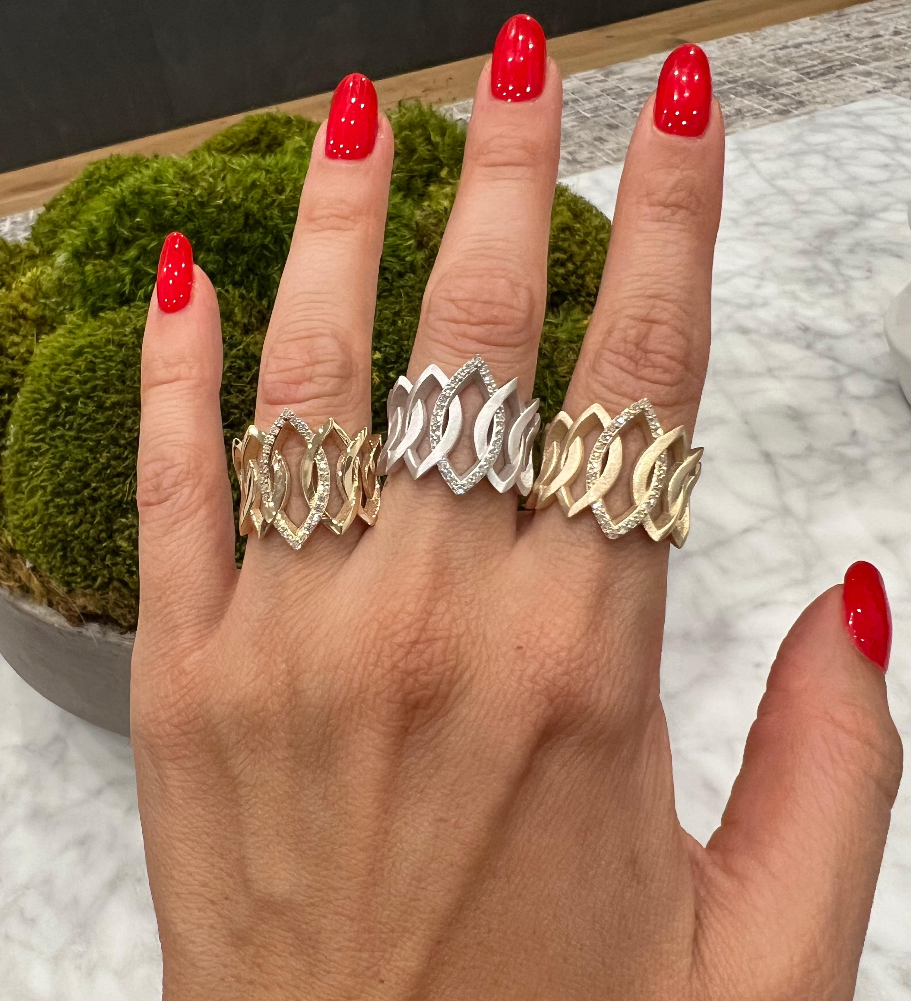 Crafted in 14K gold, this sparkling, eye-catching cuff ring is perfect for any occasion. This luxe cuff ring features a geometric design and glistening round diamonds that catch the light in different angles. Make a bold statement with this