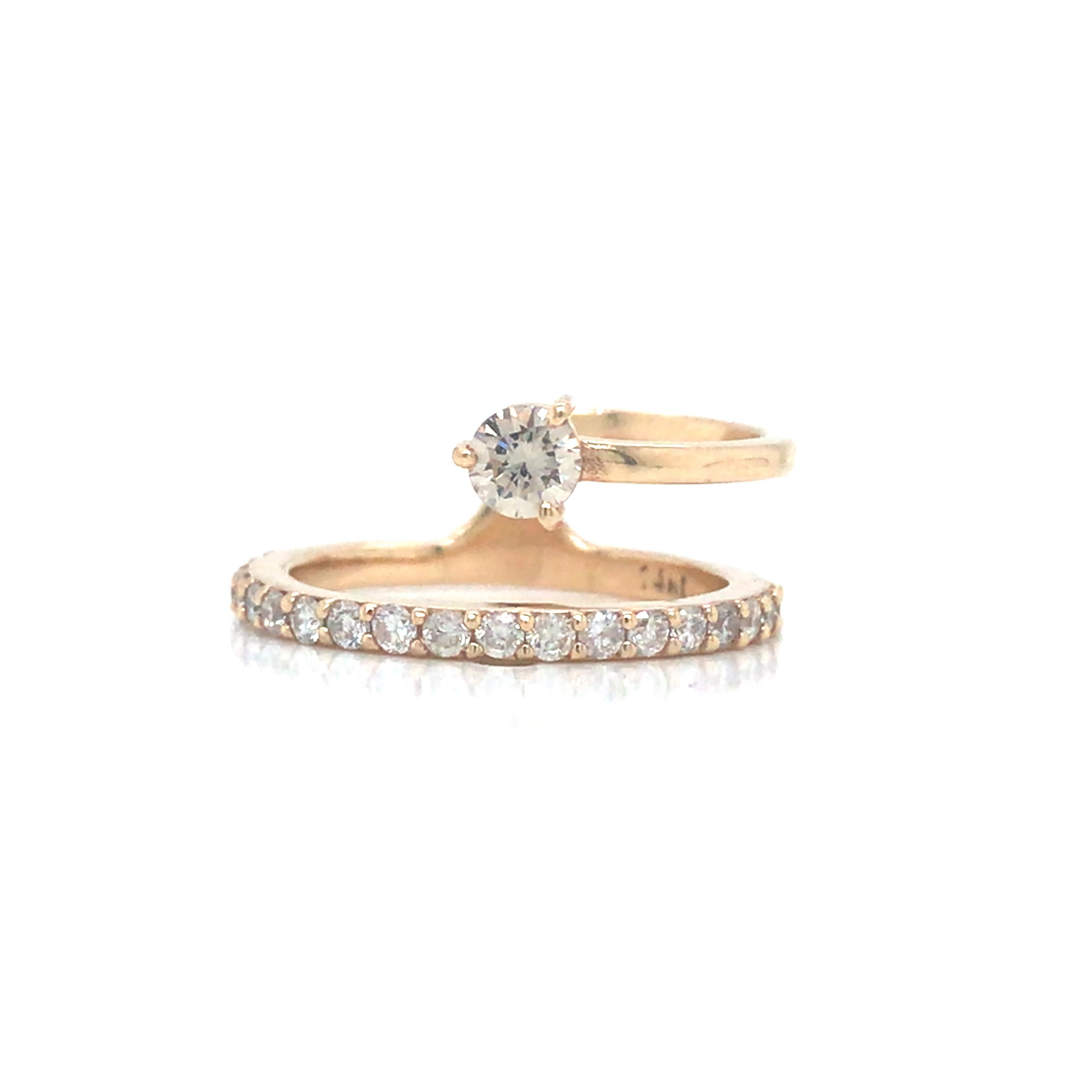 Diamond Fashion Ring in 14K Yellow Gold.  Round Brilliant Cut Diamonds weighing 0.48 carat total weight, G-H In color and VS-SI in clarity are expertly set.  The Ring measures 3/8 inch at the widest point.  Ring size 4 1/2.  2.64 grams.