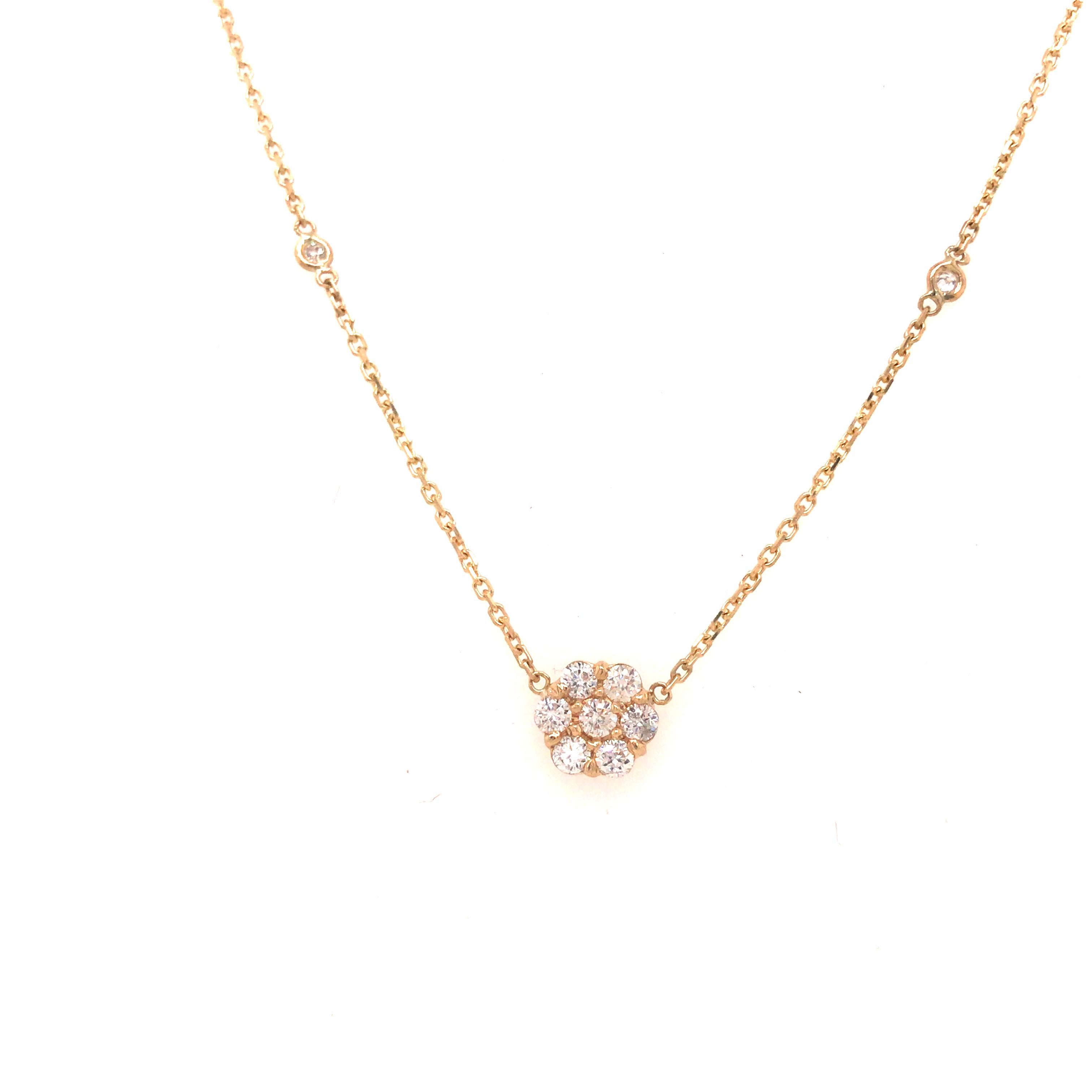 Diamond Flower Cluster Diamond By The Yard Necklace in 14K Yellow Gold.  (13) Round Brilliant Cut Diamonds weighing 0.50 carat total weight G-H in color VS-SI in clarity are expertly set.  The Necklace measures 17 1/2 inch in length and the cluster