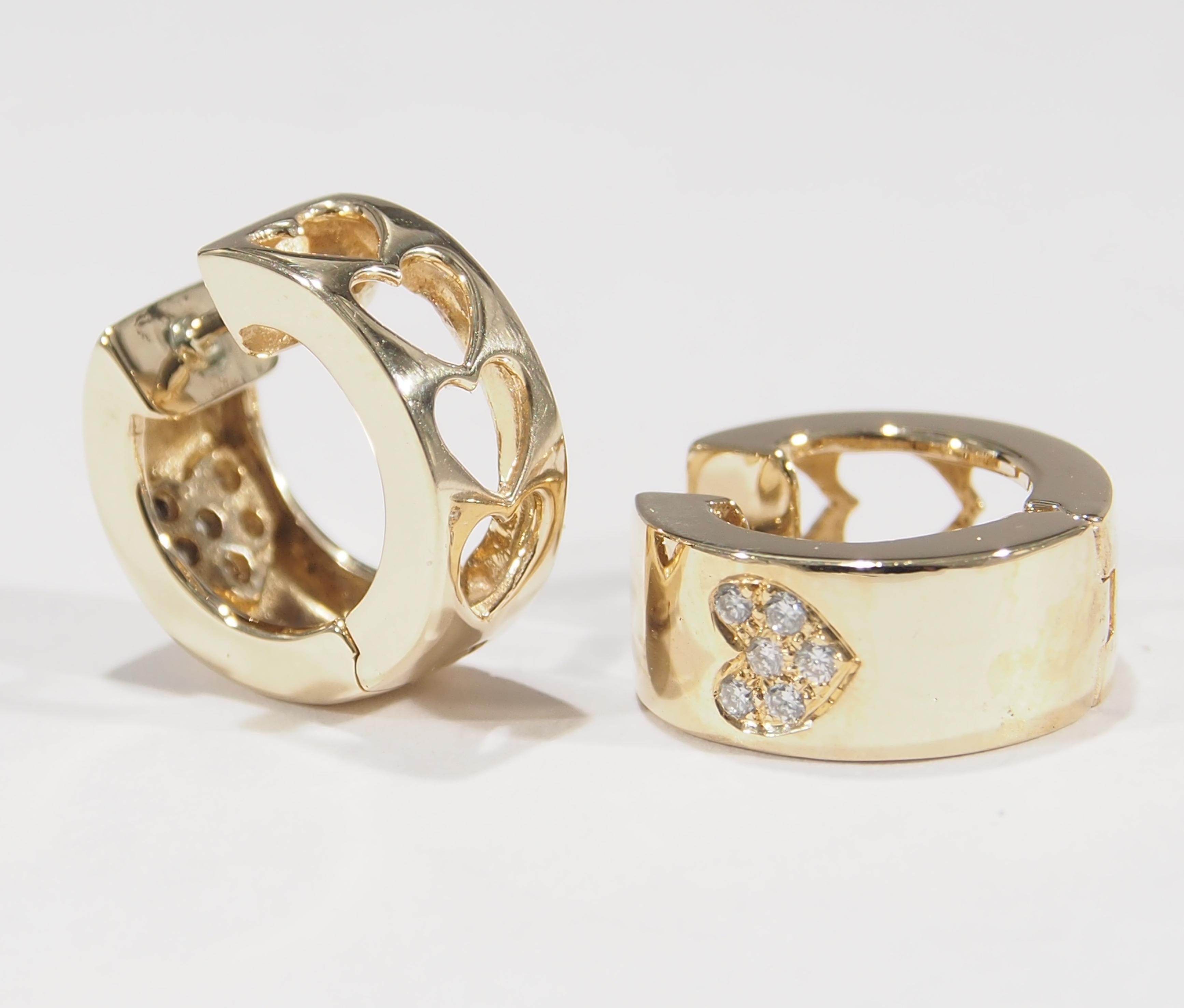 These are a delightful pair of 14K Yellow Gold Huggie Earrings designed with three heart shape cut outs in the back of the earring. Accenting the front of the earring is a heart shape pave' with (12) Round Brilliant Cut Diamonds approximately