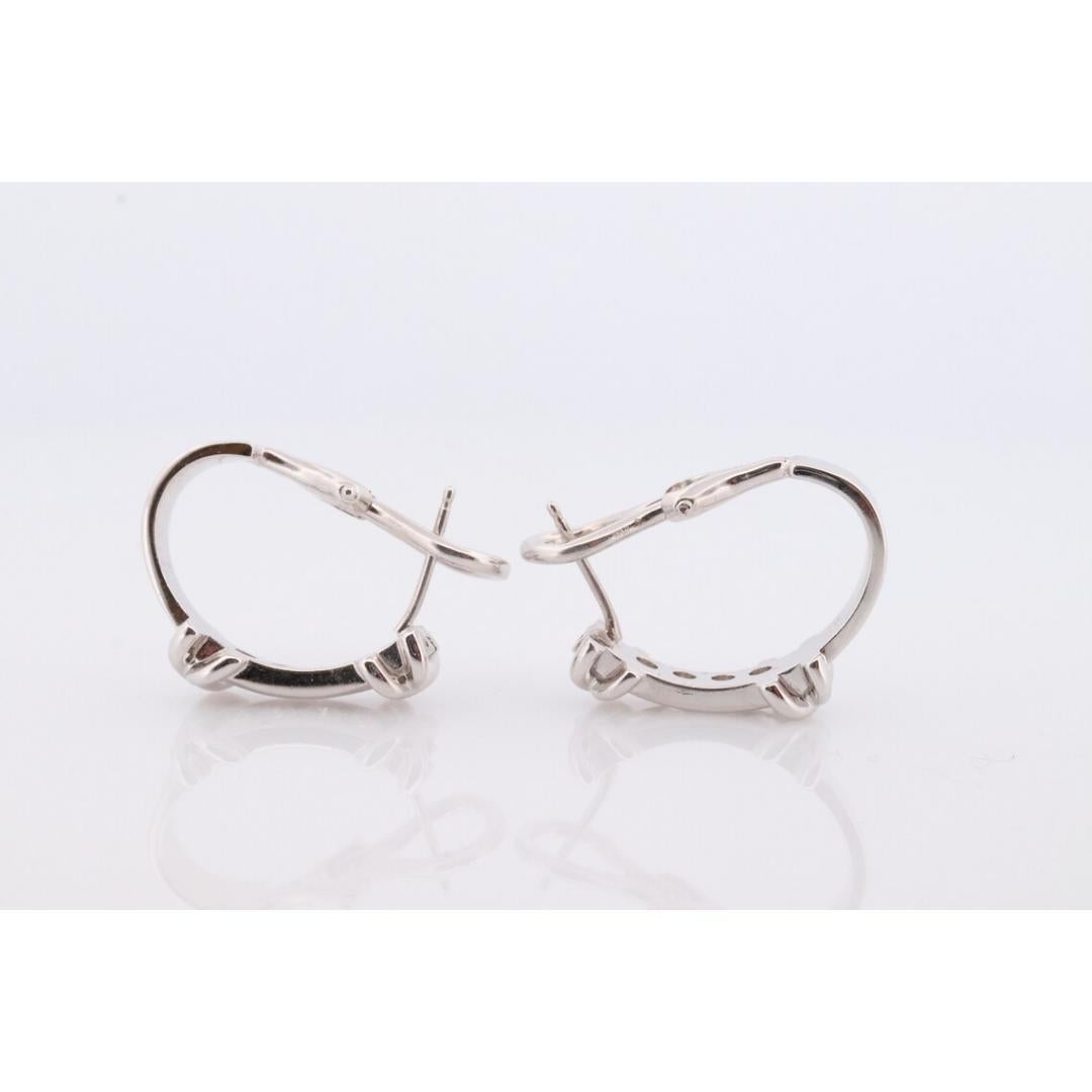 Round Cut 14k Diamond Hoop Earrings. Diamond Channel set diamond XOXO Earrings. Est 0.65ct For Sale