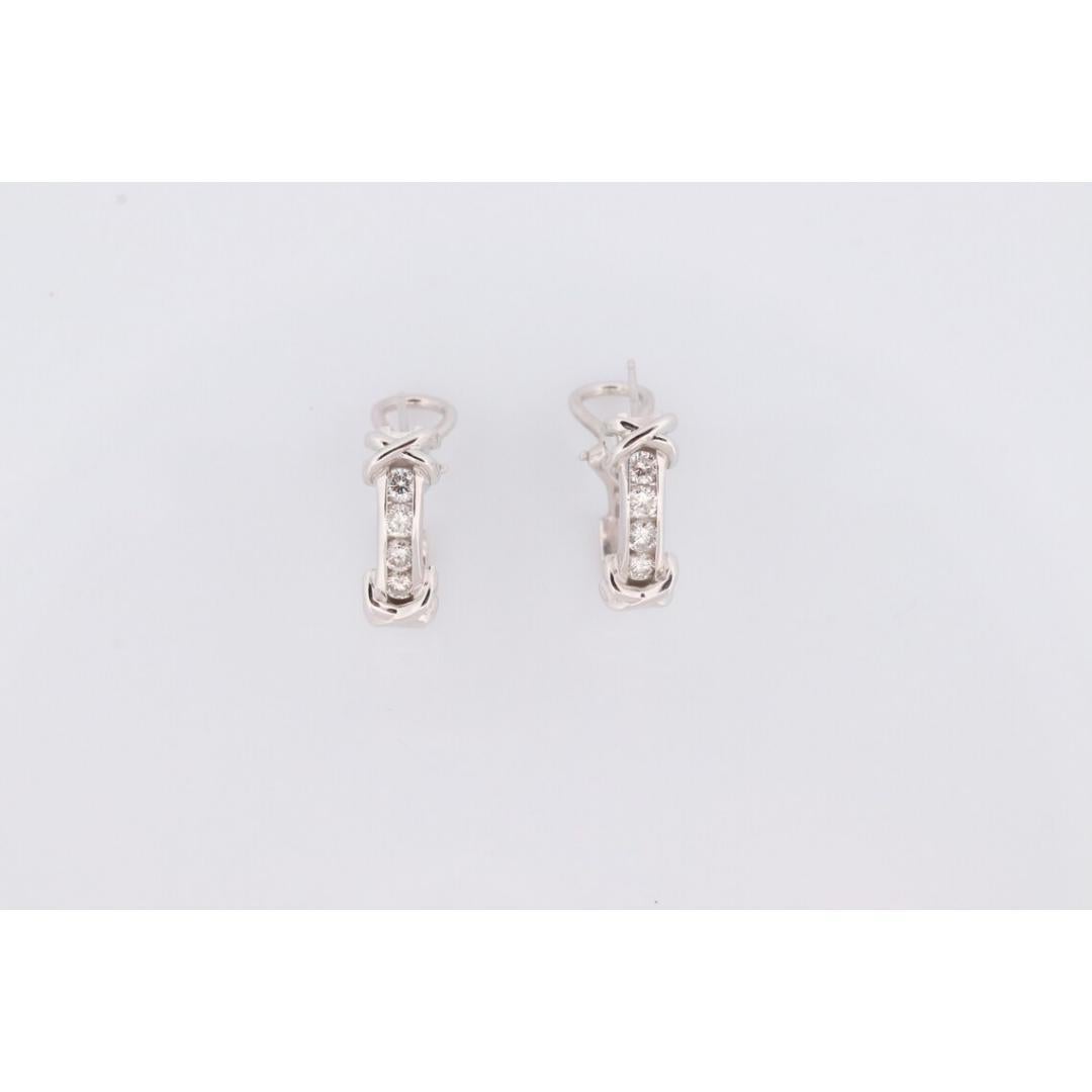 14k Diamond Hoop Earrings. Diamond Channel set diamond XOXO Earrings. Est 0.65ct In Good Condition For Sale In Port Charlotte, FL