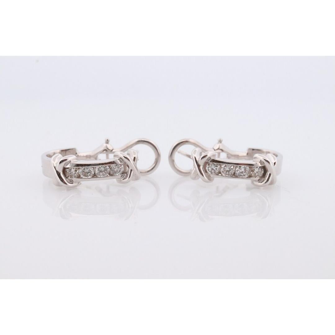 14k Diamond Hoop Earrings. Diamond Channel set diamond XOXO Earrings. Est 0.65ct For Sale 1