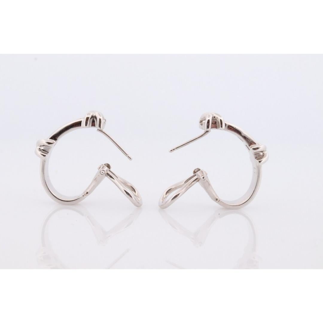 14k Diamond Hoop Earrings. Diamond Channel set diamond XOXO Earrings. Est 0.65ct For Sale 2