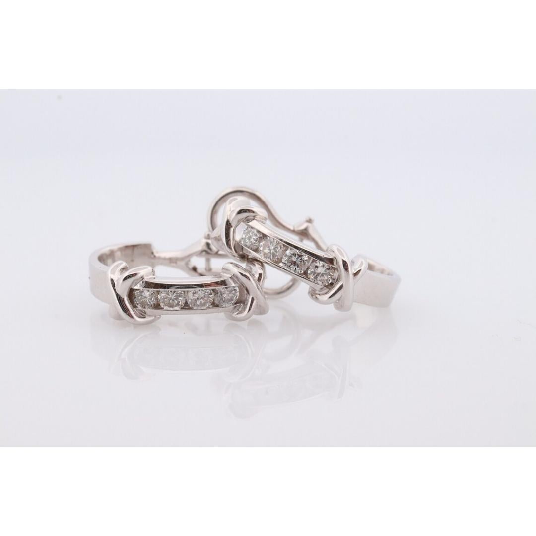 14k Diamond Hoop Earrings. Diamond Channel set diamond XOXO Earrings. Est 0.65ct For Sale 3