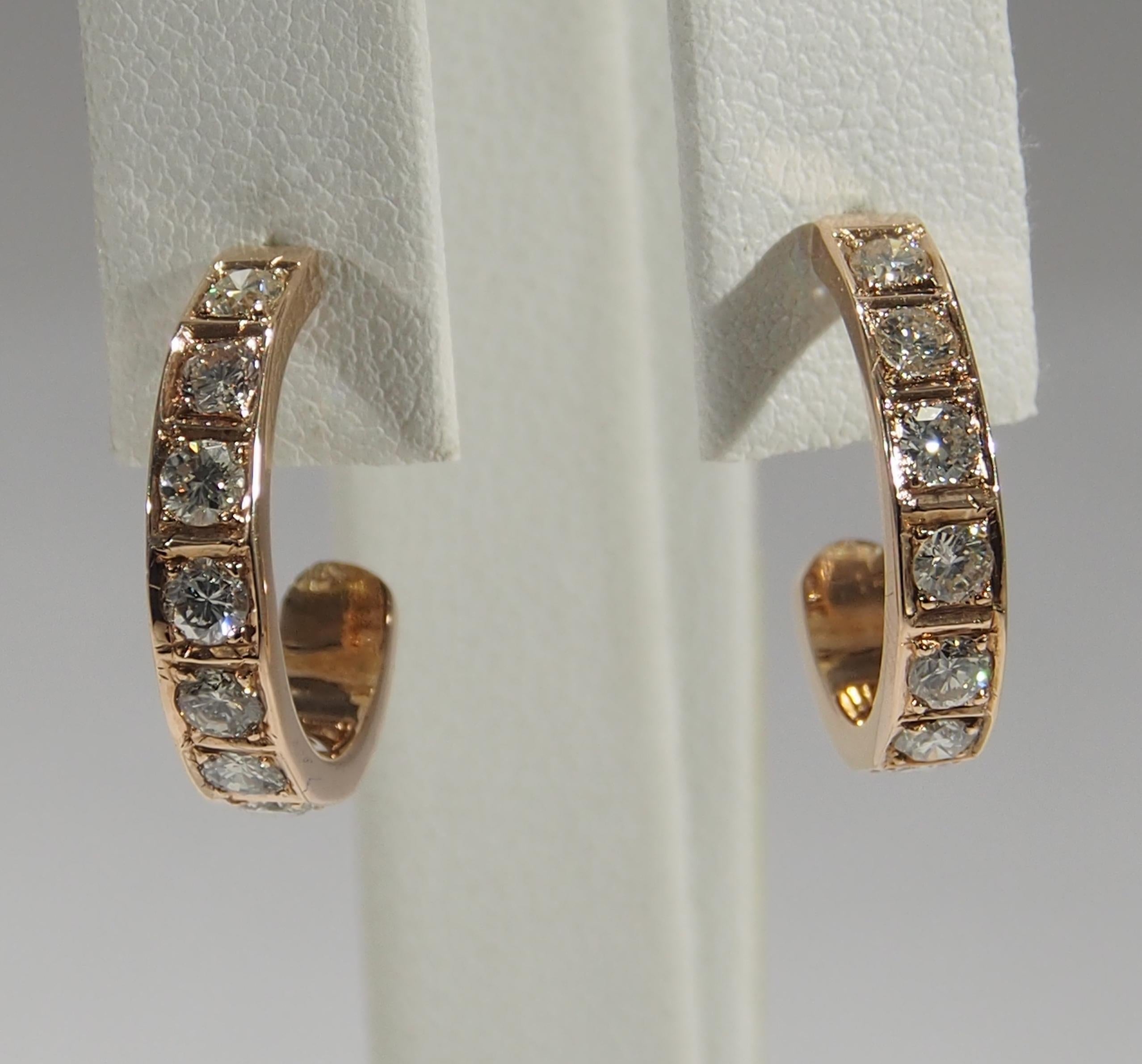 A classic vintage pair of 12K Rose Gold Half-Hoop Earrings. Prong set with (8) Round Brilliant Cut Diamonds G-H in color VS-SI in quality and approximately 1.32ctw. The gold weighs approximately 4.35 grams and are 1 1/8