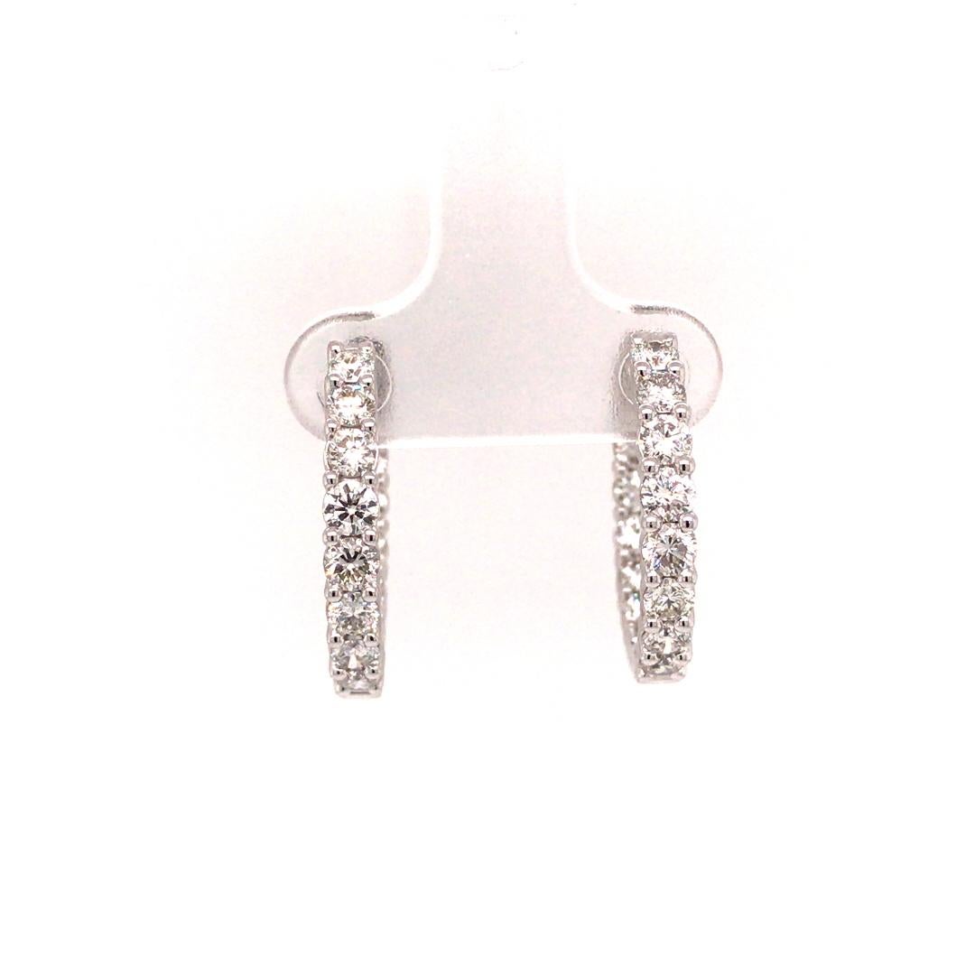Diamond In/Out Hoop Earrings in 14K White Gold.  Round Brilliant Cut Diamonds weighing 2.00 carat total weight, G-H in color and VS in clarity are expertly set.  The Earrings measure 3/4 inch in diameter.  5.90 grams.