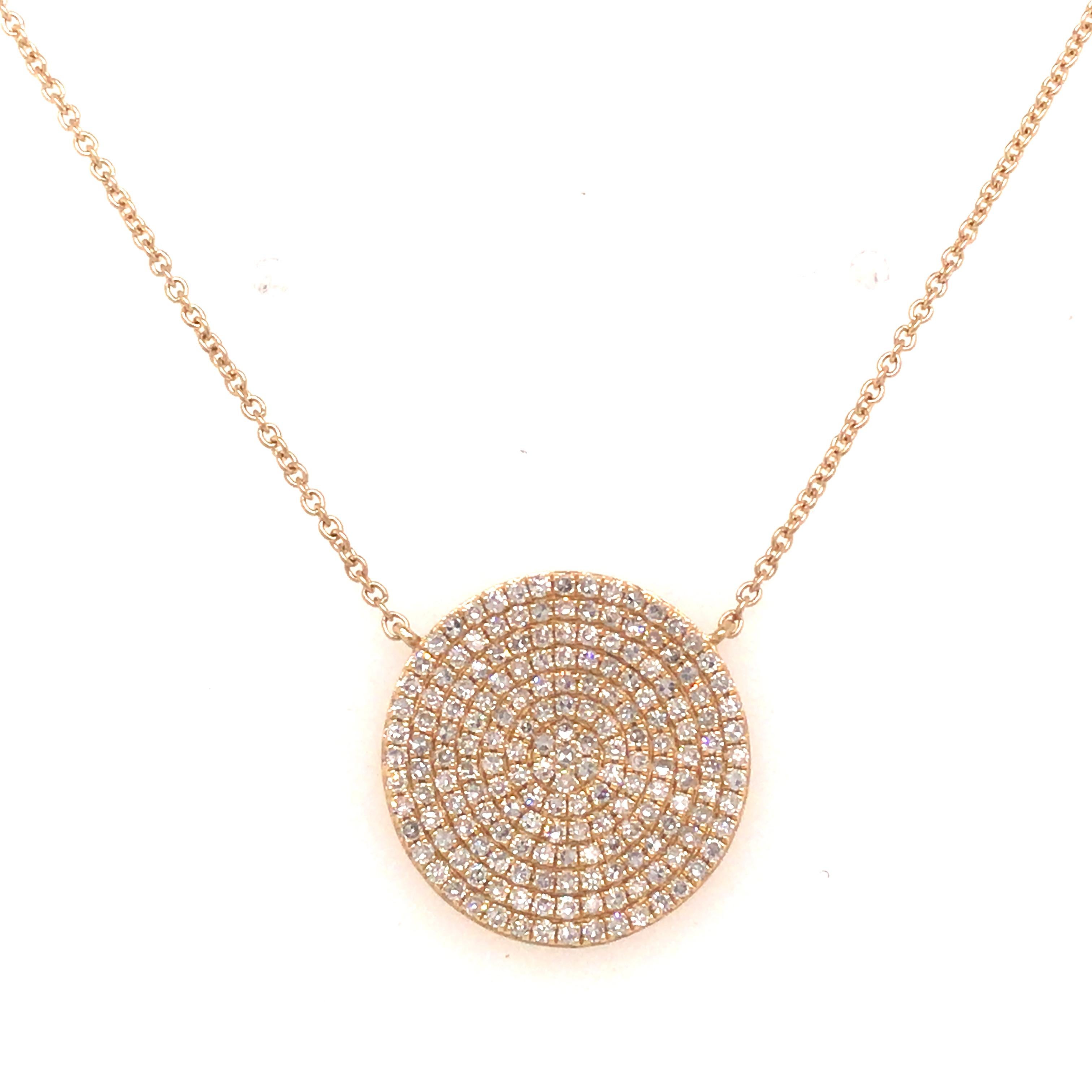 Diamond Pave Circle Disc Pendant Necklace in 14K Yellow Gold. (79) Round Brilliant Cut Diamonds weighing 0.58 carat total weight, G-H in color and VS in clarity are expertly set. The Necklace is adjustable in length at 18 inch, 17 inch, 16 inch and