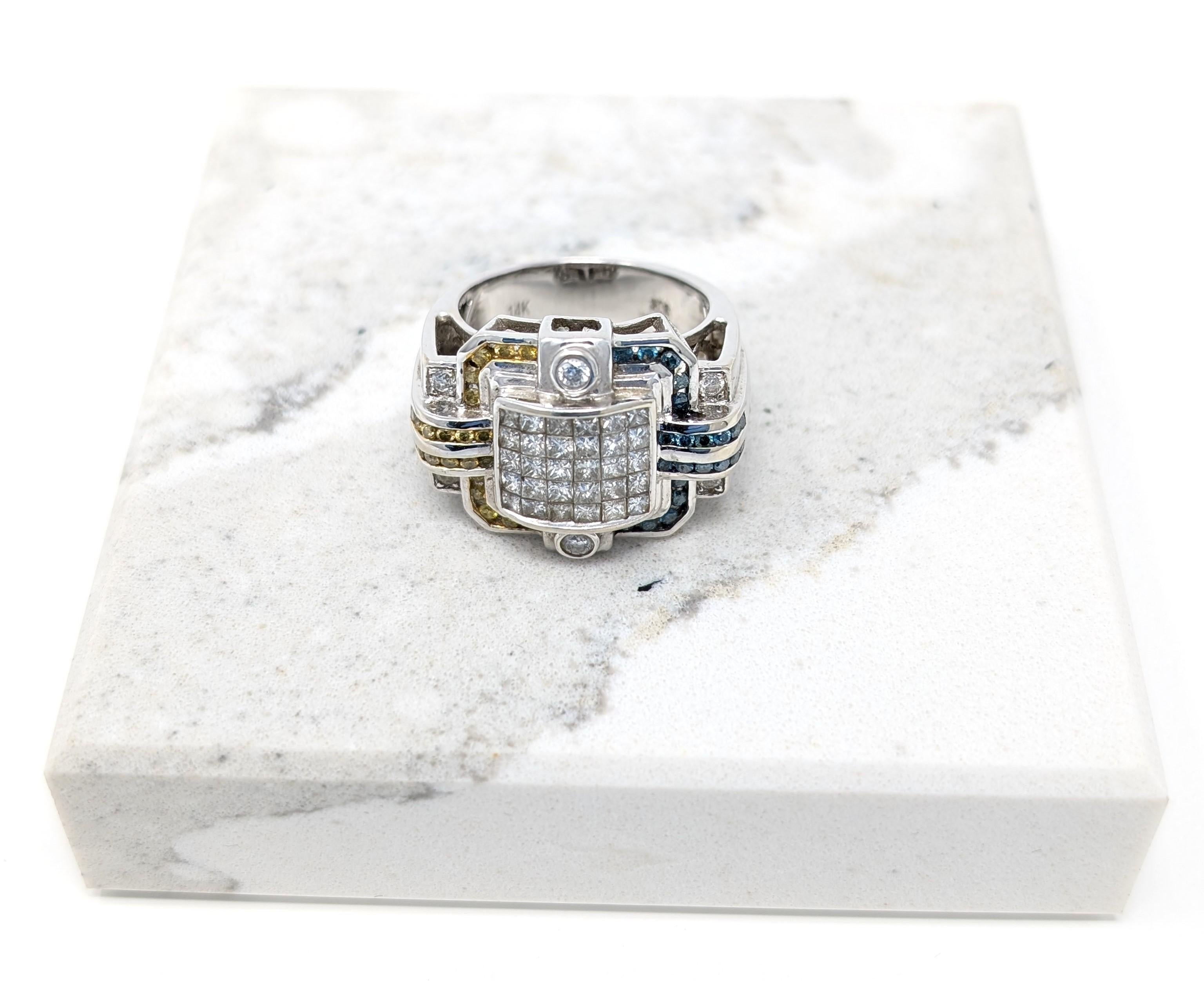 Large and eye catching 14k solid white gold ring by designer Luxurman. Features dazzling clear, yellow, and blue diamonds, signed on the interior of the band. Best measures for a US size 8.5 finger, the centerpiece measures .7 inch in height by .95