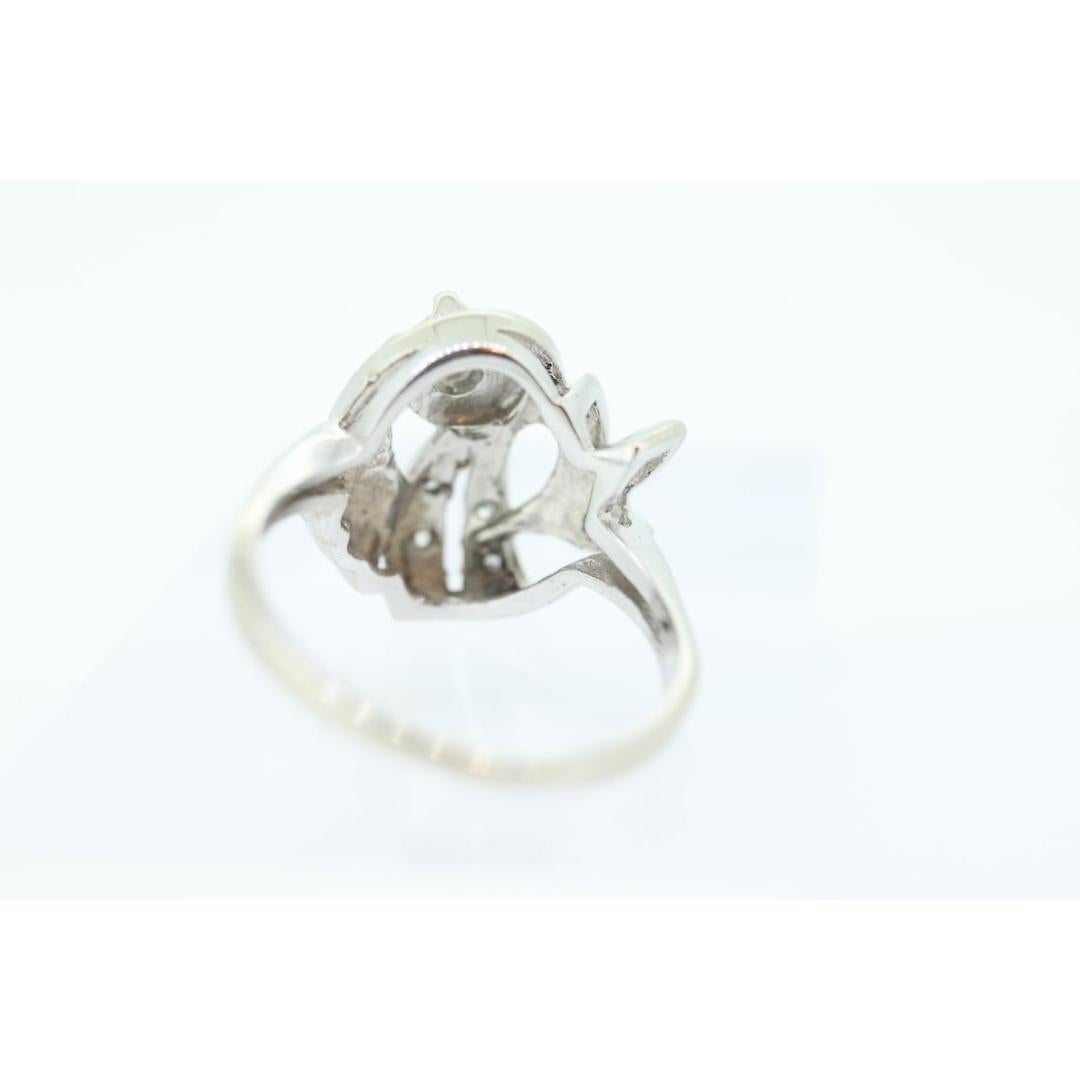 14k Diamond Ring. Leaf Setting Diamond with accents. Diamond Bow Love Knot ring. In Good Condition For Sale In Port Charlotte, FL