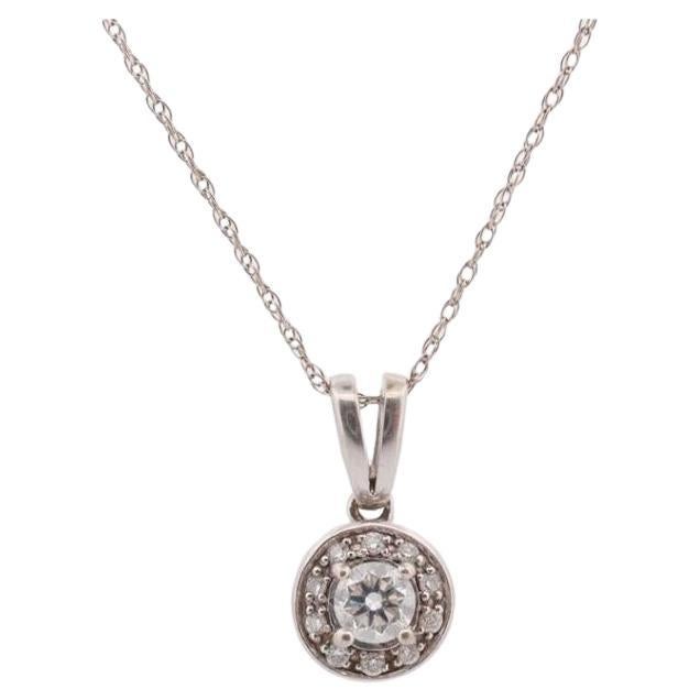 14k Diamond Solitaire Halo Pendant. 14k White gold and 24K Yellow Gold Inlay