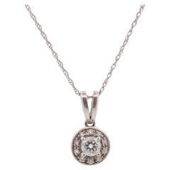 14k Diamond Solitaire Halo Pendant. 14k White gold and 24K Yellow Gold Inlay