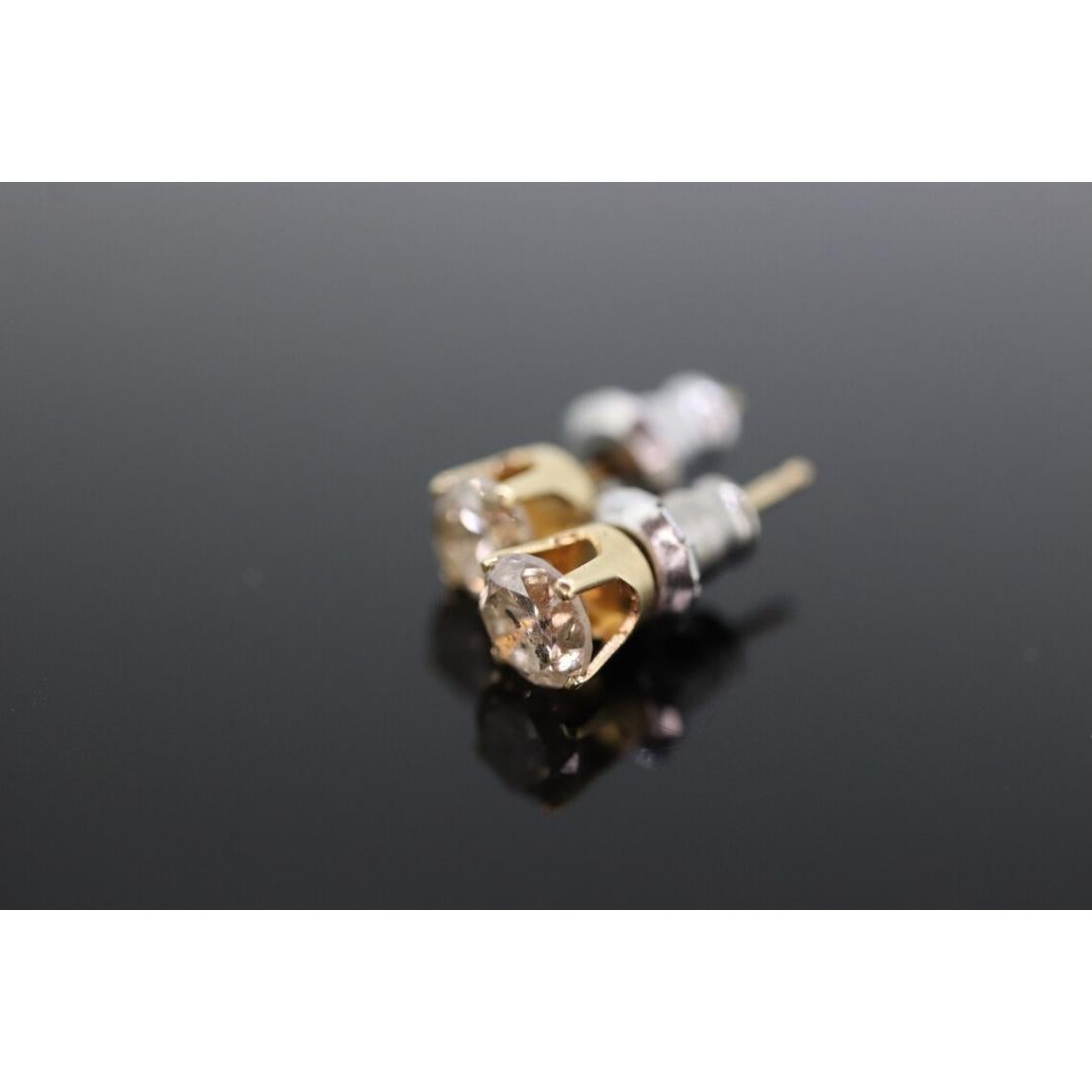 Women's 14k Diamond studs 1/2ctw diamond gold earrings. 14k yellow Gold Diamond For Sale