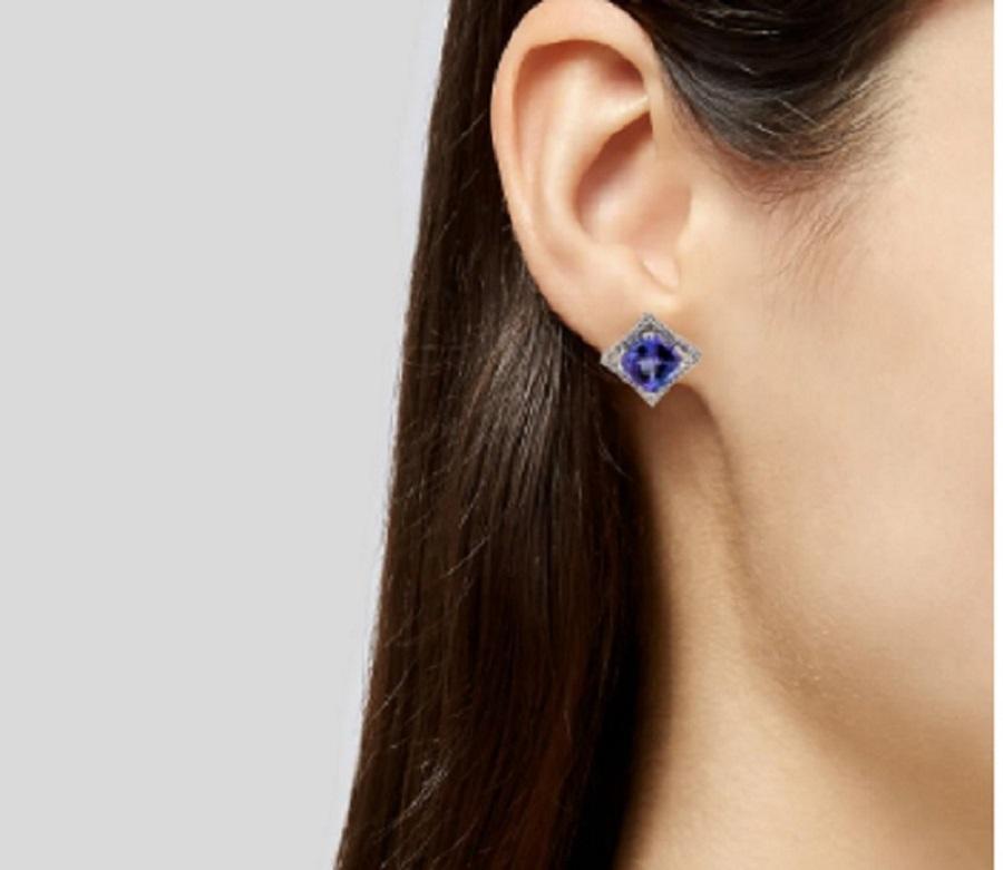 This is a breath-taking tanzanite and diamond stud earrings stamped in 14K white gold. The striking tanzanite has a rich color and is encompassed by delicate white diamonds.

*****
Details:
►Metal: White Gold
►Gold Purity 14K
► Tanzanite Weight: