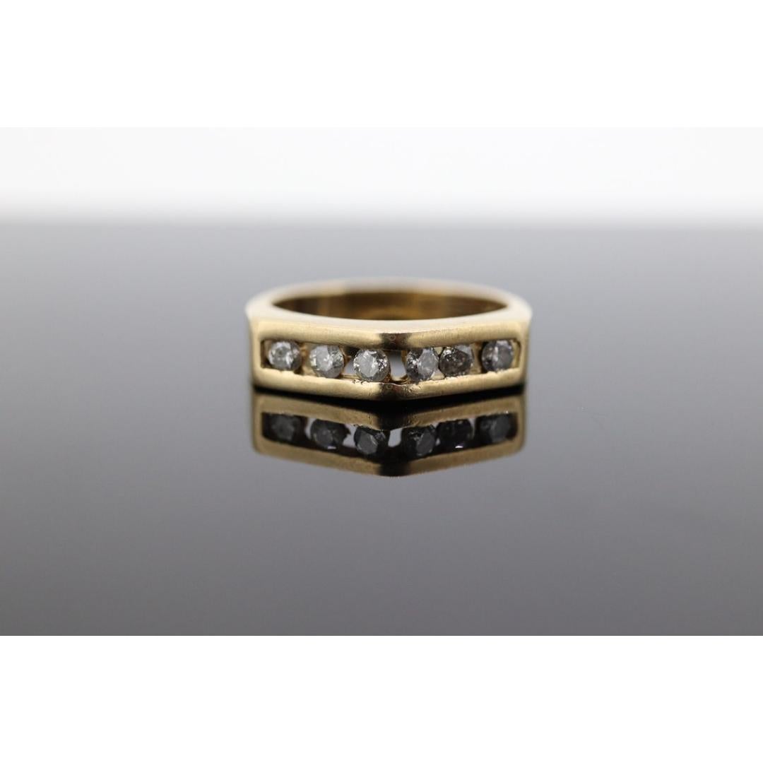 14k diamond tension set Eternity ring. 14k Diamond channel infinity chevron In Good Condition In Port Charlotte, FL