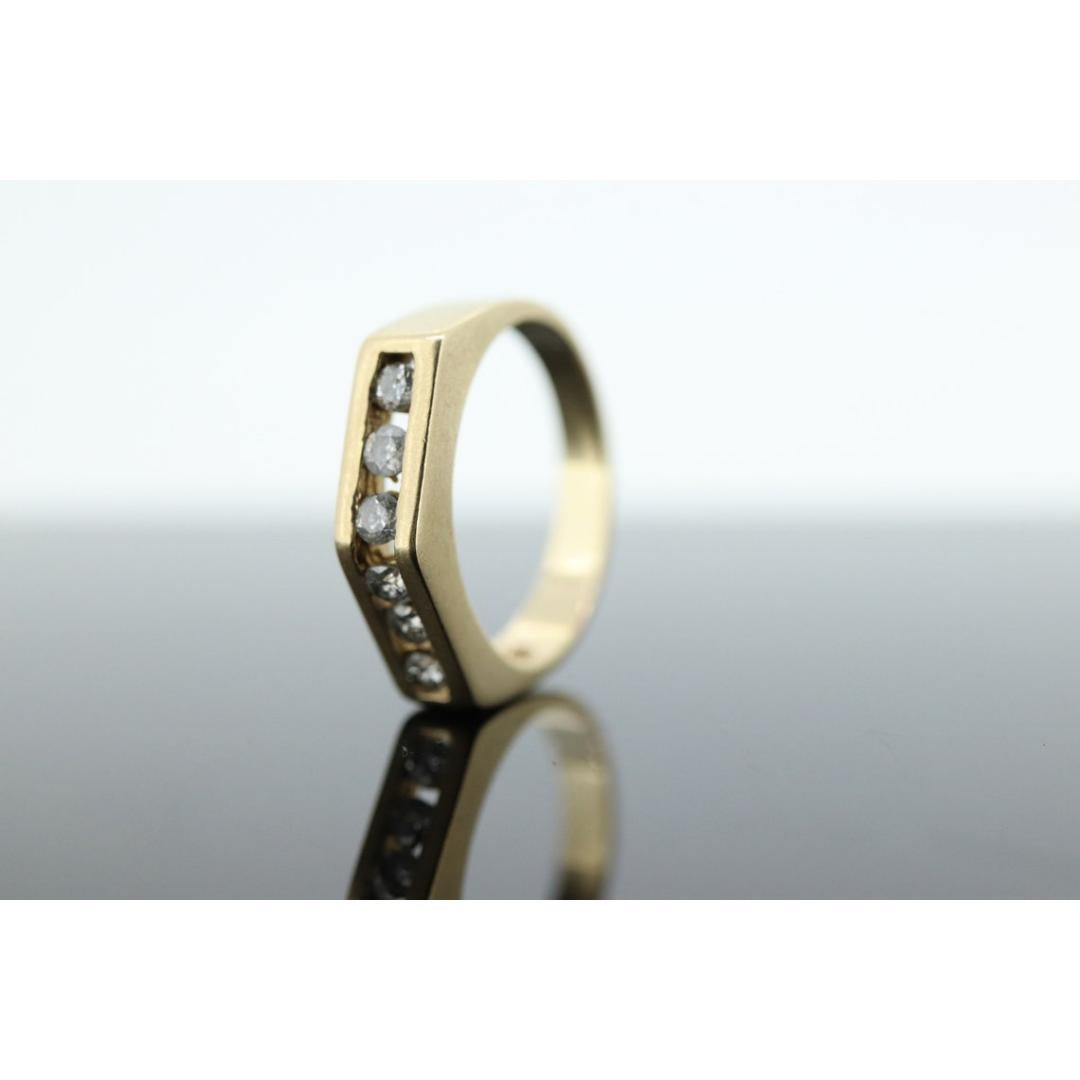 14k diamond tension set Eternity ring. 14k Diamond channel infinity chevron 1