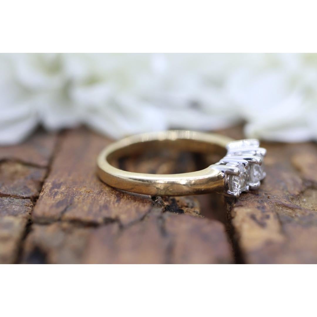 Vintage from the 1980s
Size: 5 US
Materials: Stone
Gemstone: Diamond
Gem Color: Colorless
Band Color: Gold

Style: Minimalist

Beautiful 3 stone Diamond ring Sparkles from all directions. Make this ring your engagement ring or you everyday