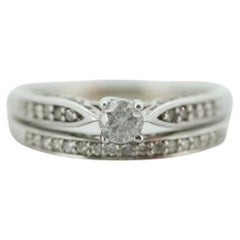 Used 14k Diamond Wedding Ring Set. Delicate White gold Engagement and Wedding rings.
