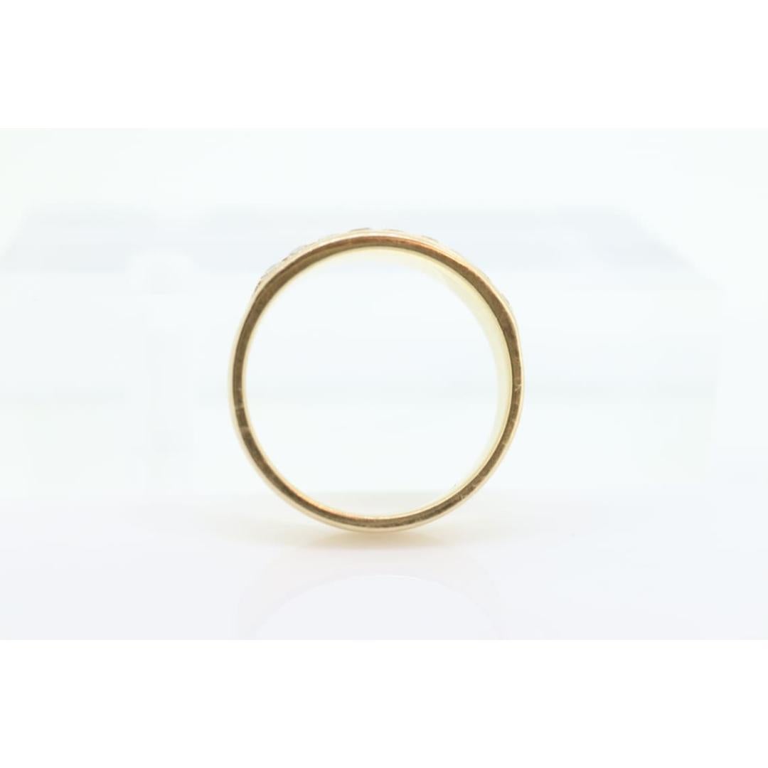 Vintage
Size: 6 US
Materials: Gold
Gemstone: Diamond
Gem Color: Colorless

Band Color: Gold

Classic Mens Wedding Band. 14k White Gold. Double Row channel set diamonds. Ring is made by the popular LEO diamonds. Hallmarked appropriately with a bezel