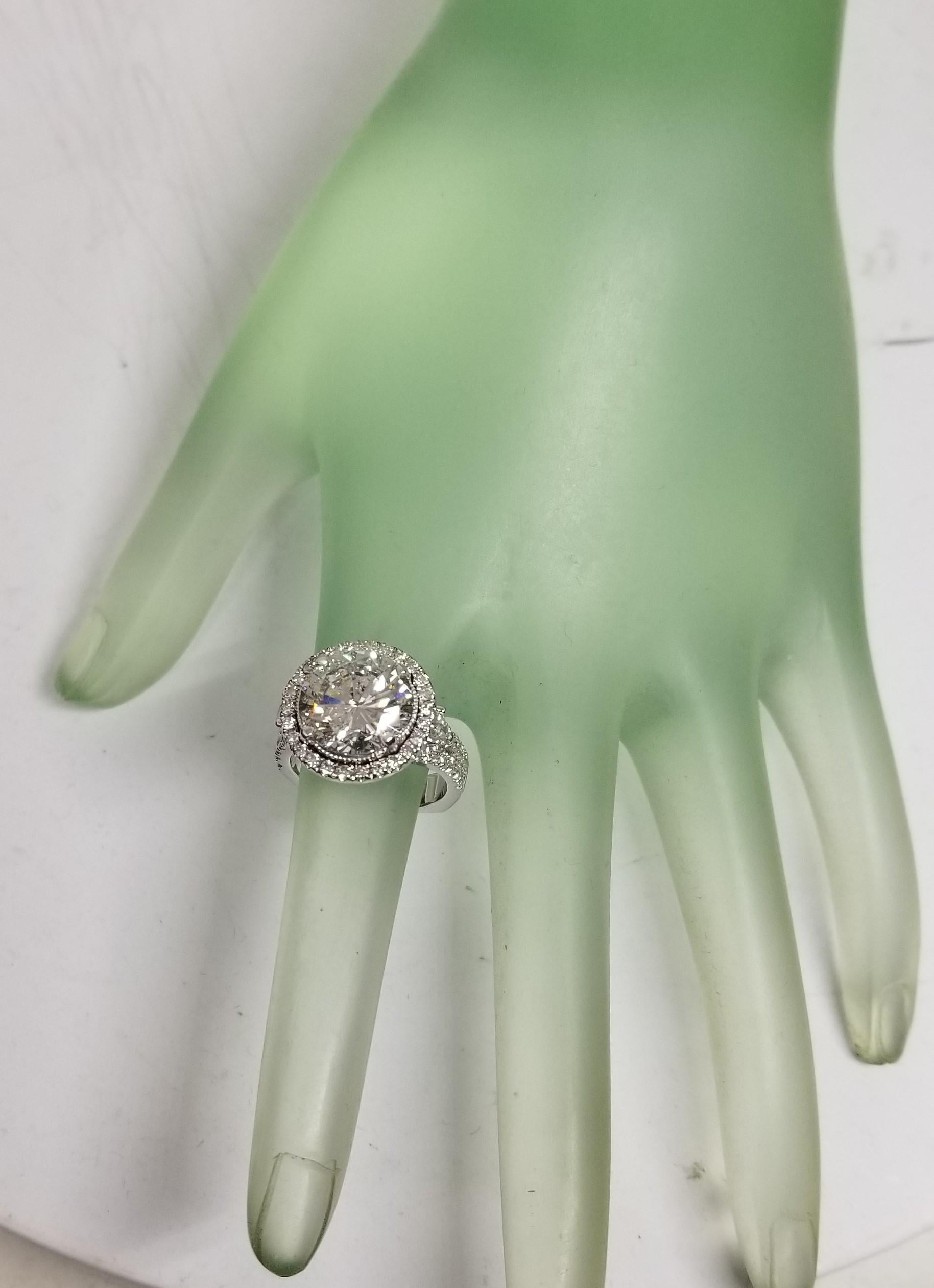 Contemporary 14k EGL Certified H color SI2 clarity Round 5.24 Carat Diamond Ring