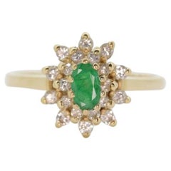 14k Emerald and Diamond Halo yellow gold ring. Emerald and Diamond Cluster ring.