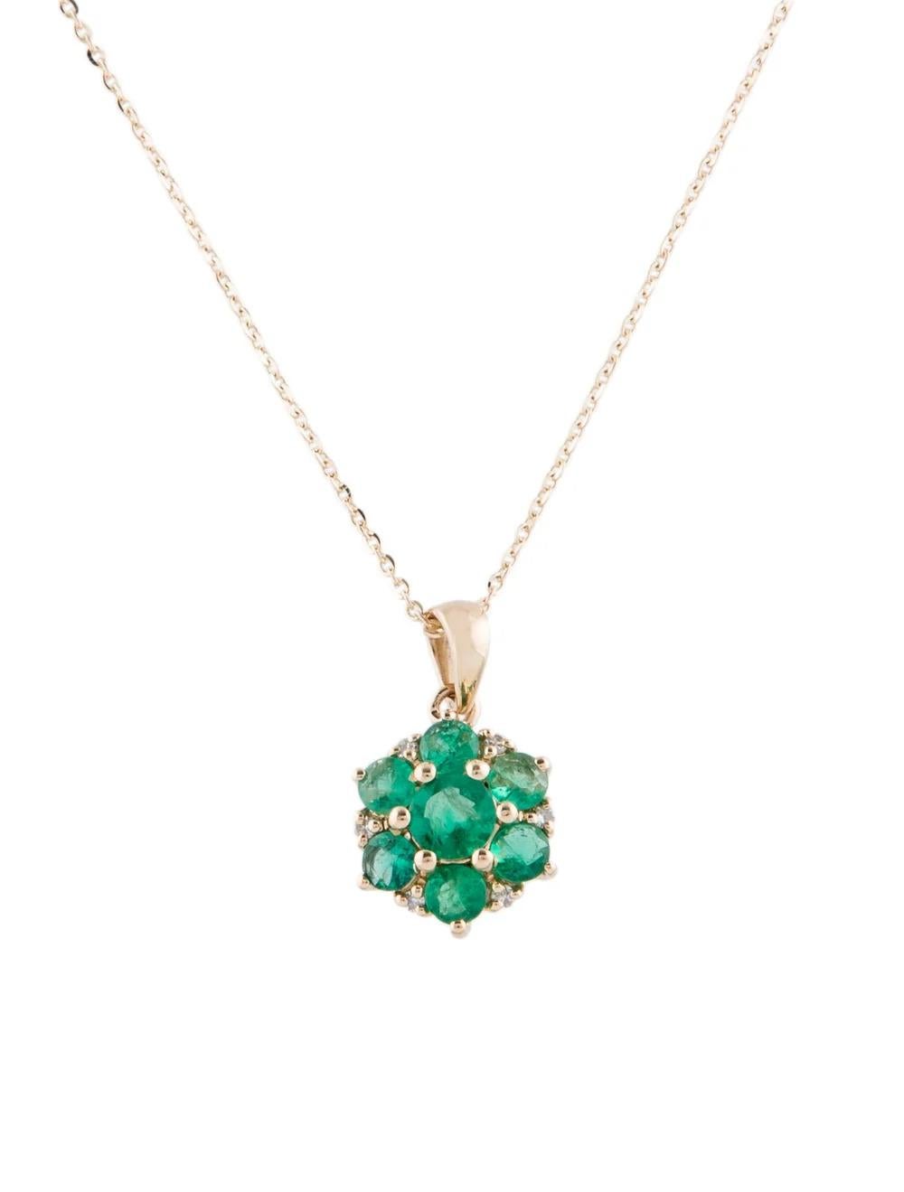 Step into elegance with this exquisite 14K yellow gold pendant necklace, showcasing a captivating 0.74 carat round brilliant emerald. Crafted to perfection, this piece exudes sophistication and timeless beauty, making it a standout addition to any