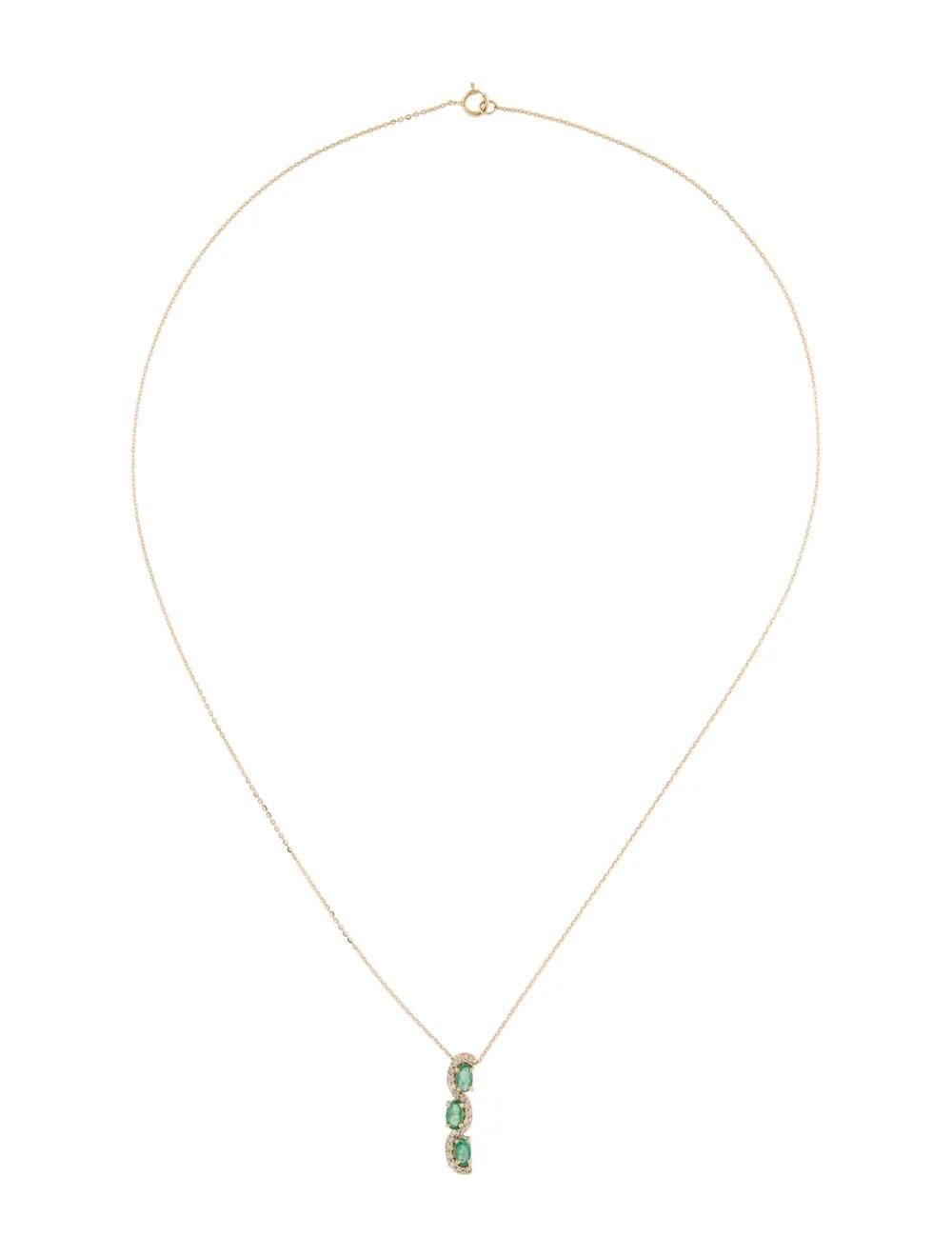 14K Emerald Diamond Pendant Necklace - Timeless & Elegant Statement Jewelry In New Condition For Sale In Holtsville, NY