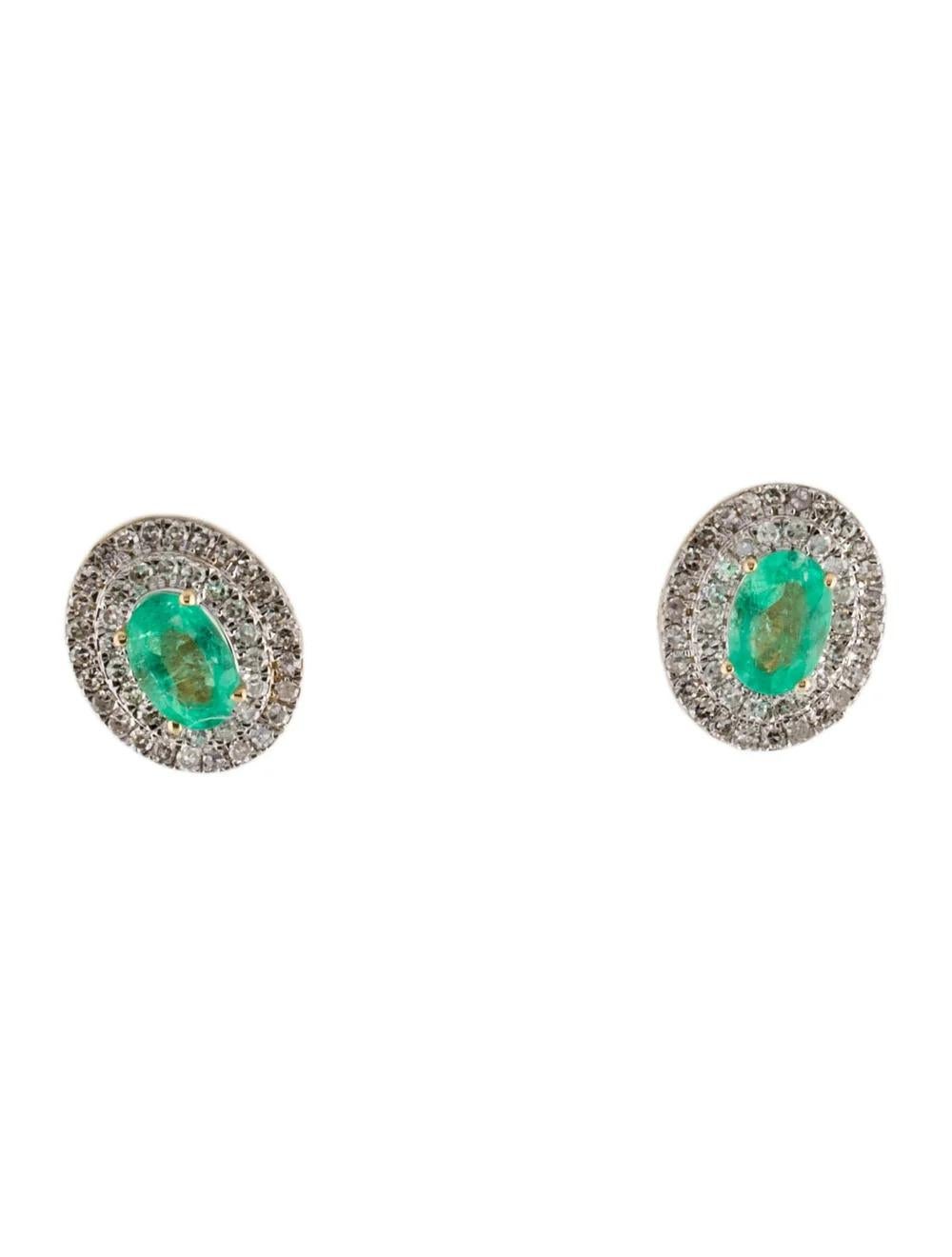 Experience timeless elegance with these stunning 14K Yellow Gold Emerald and Diamond Stud Earrings. Crafted to perfection, these earrings feature exquisite gemstones set in luxurious gold, promising to elevate any ensemble with sophistication and