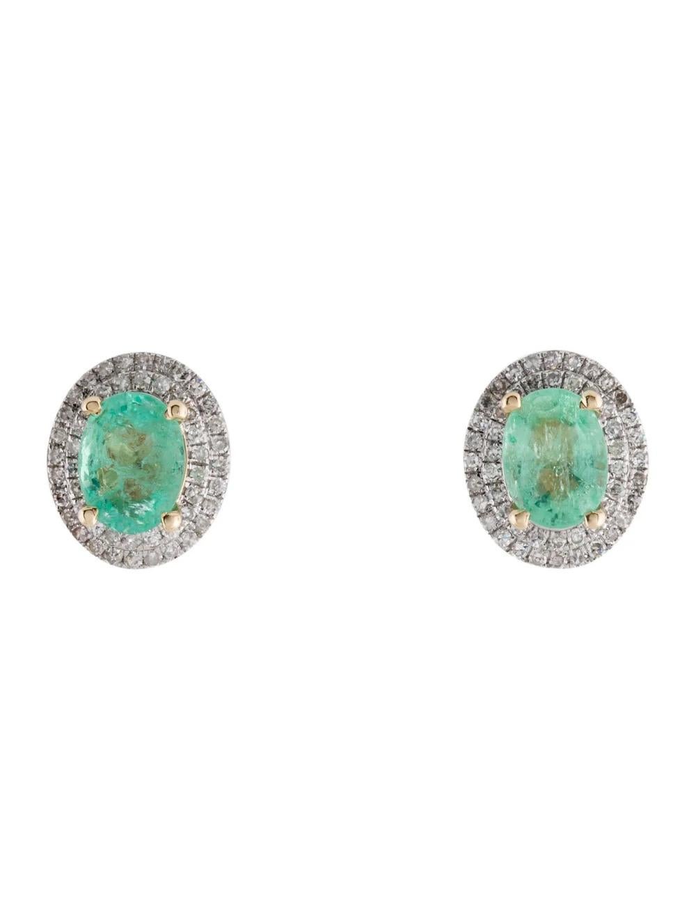 This stunning pair of earrings combines the timeless elegance of emeralds with the brilliance of diamonds, creating a captivating accessory that is sure to turn heads. Crafted in rhodium-plated 14K yellow gold, these earrings exude luxury and